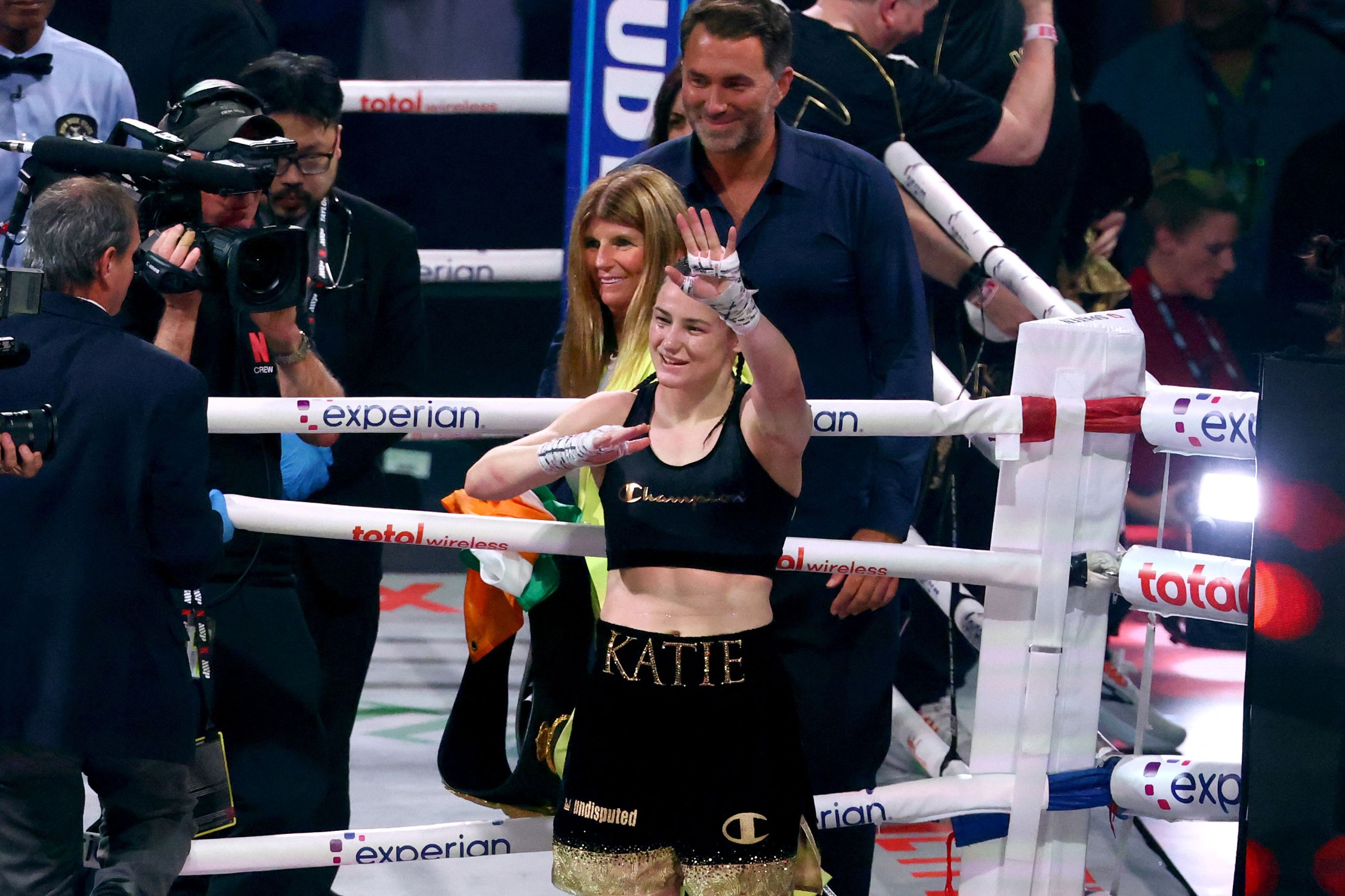 Taylor holds off Serrano, retains crown in trilogy bout