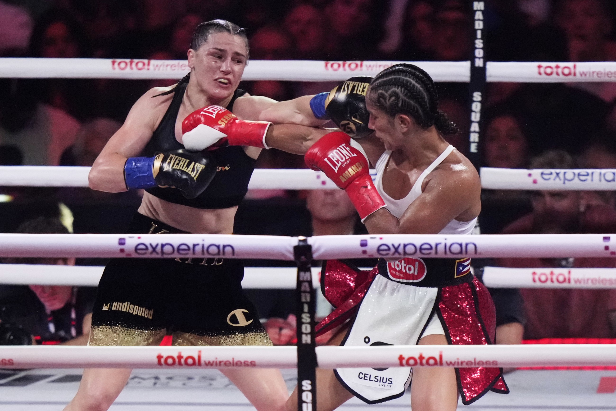 Taylor holds off Serrano, retains crown in trilogy bout