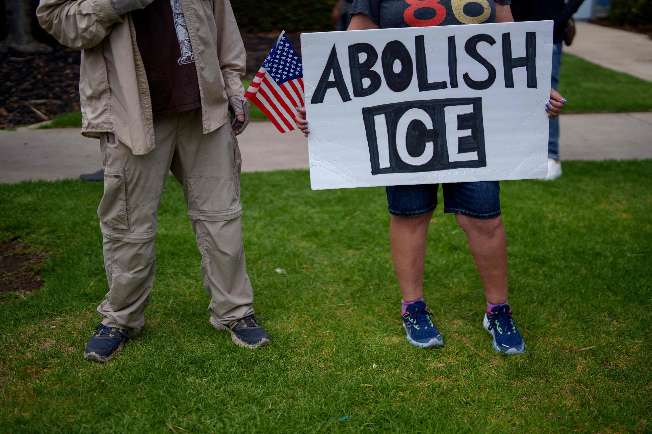 One dead, hundreds arrested in US farm raid as judge orders pause to aggressive tactics