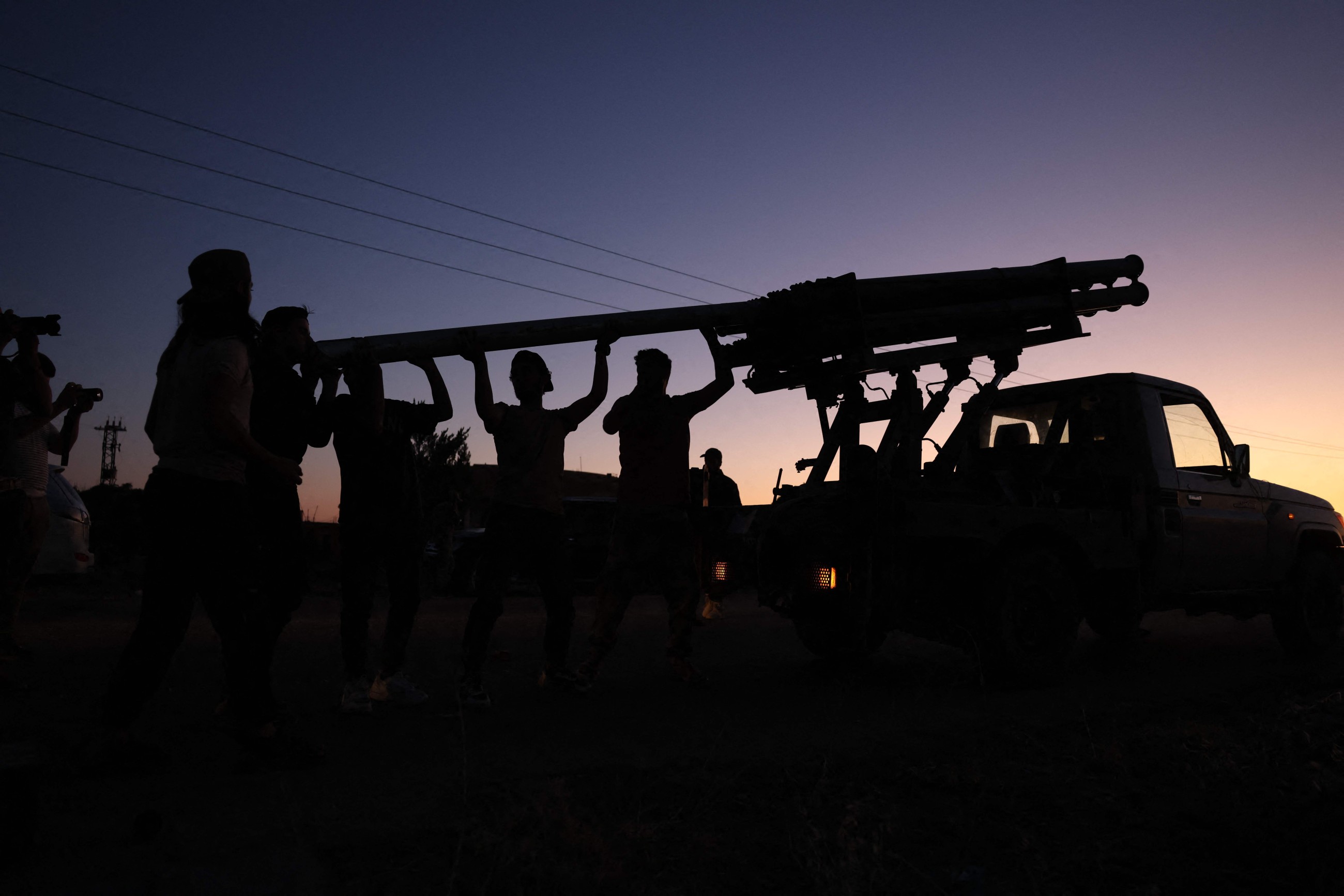 Israel strikes military tanks in Syria, where government forces clash with Druze militias