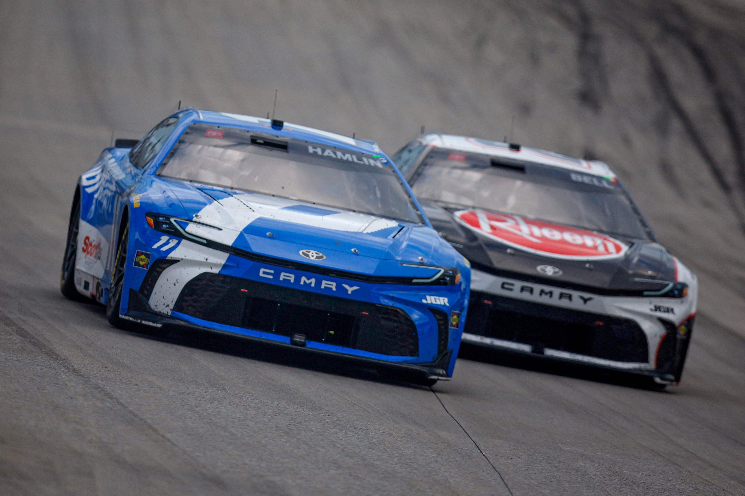 Denny Hamlin survives rain delay, overtime finish to win for 2nd straight year at Dover