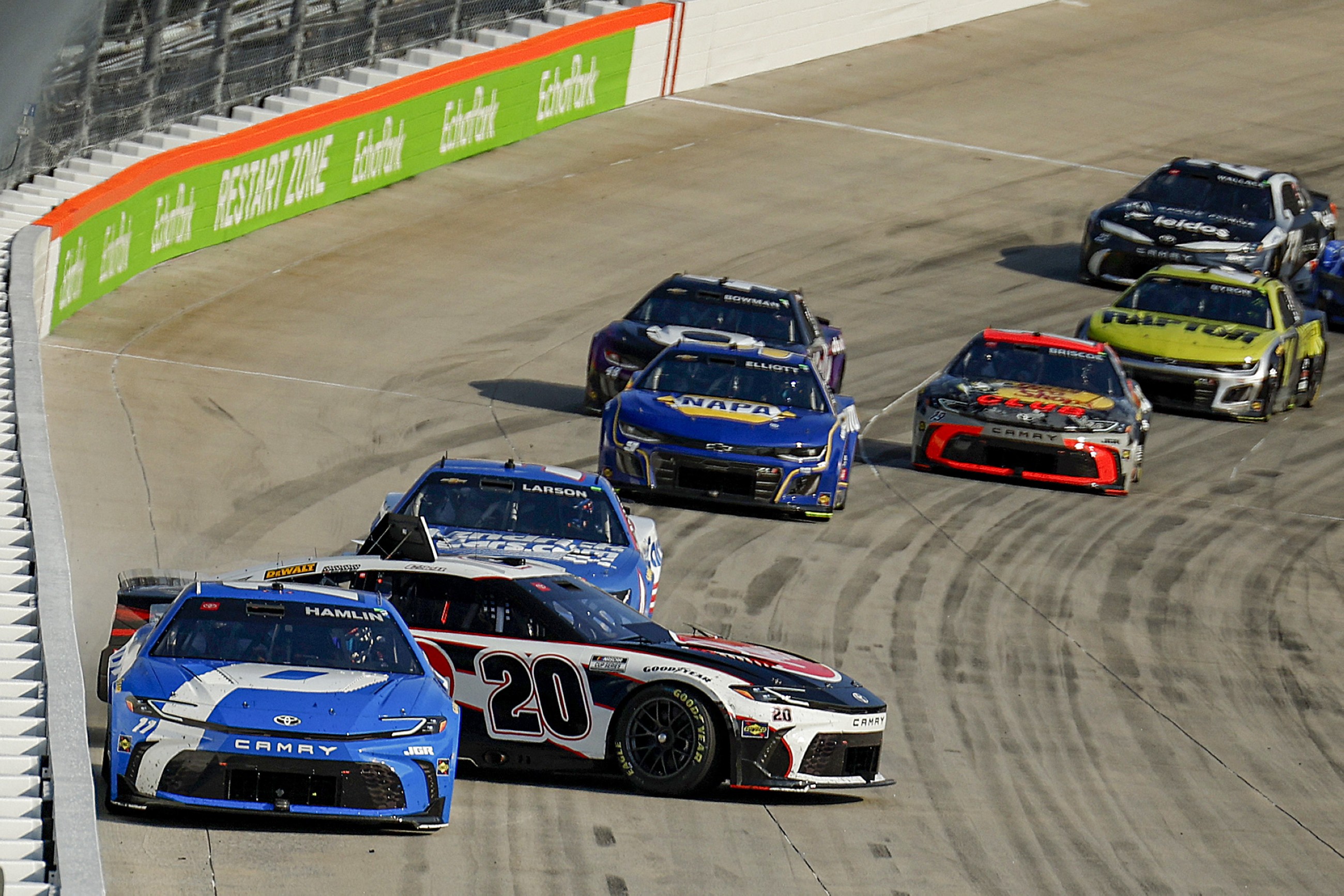 Denny Hamlin survives rain delay, overtime finish to win for 2nd straight year at Dover