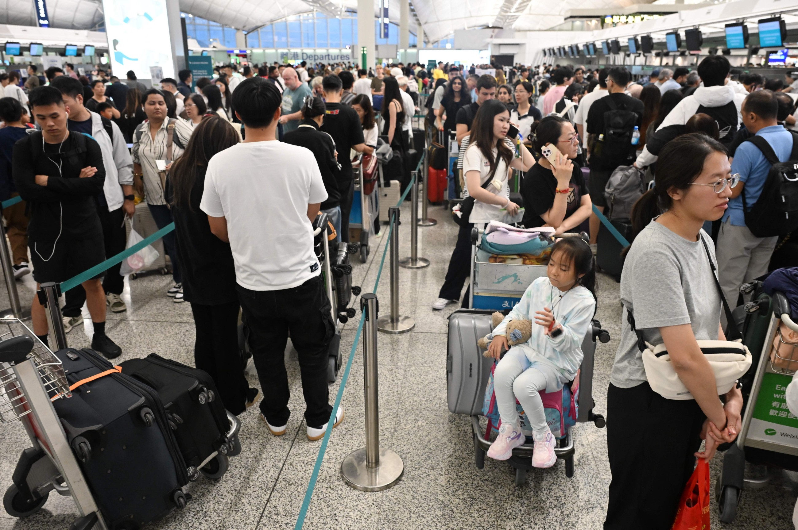 Hundreds of flights hit as storm plays havoc in Hong Kong