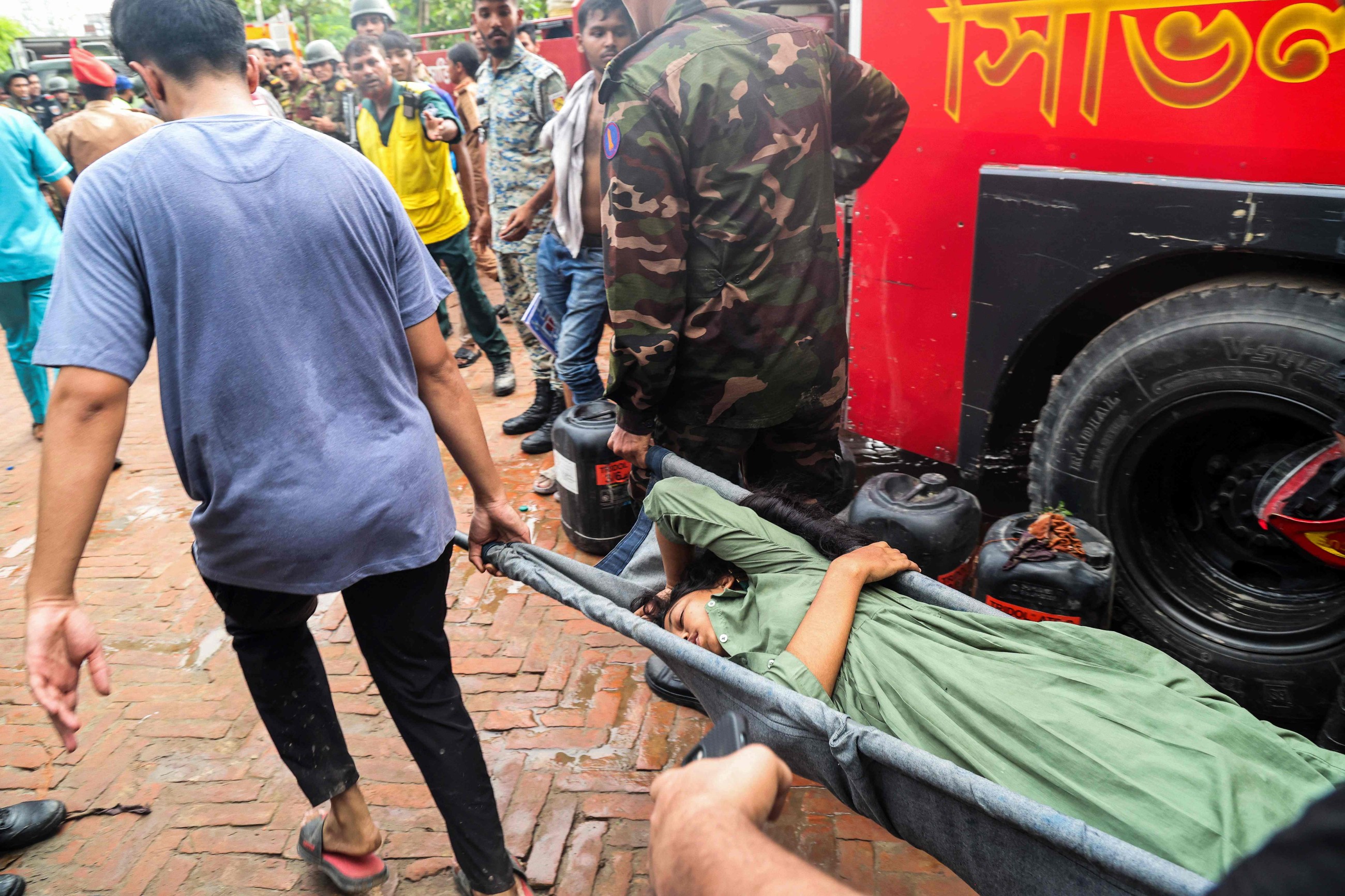 Air force training jet crashes into school in Dhaka, killing at least 19