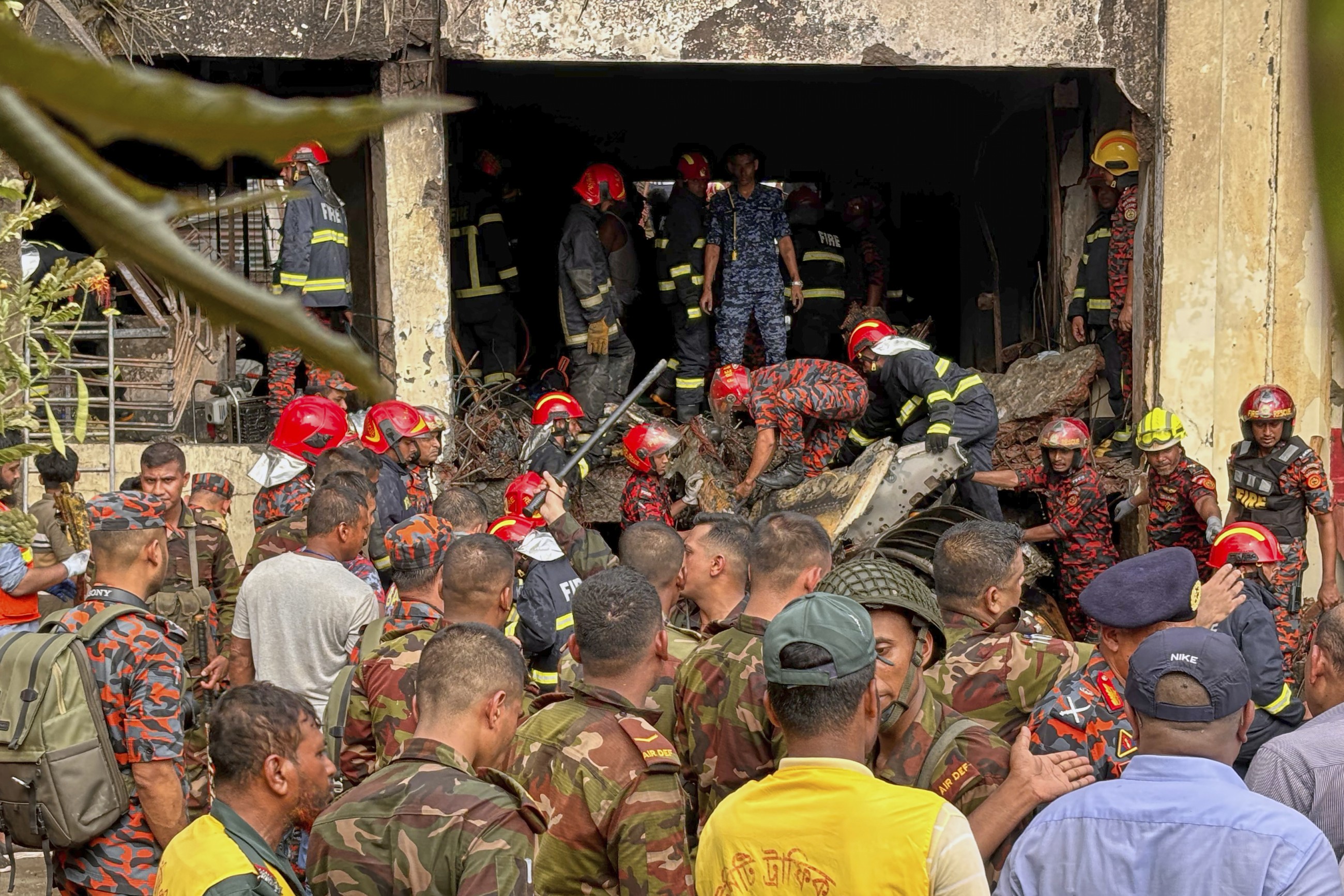 Air force training jet crashes into school in Dhaka, killing at least 19