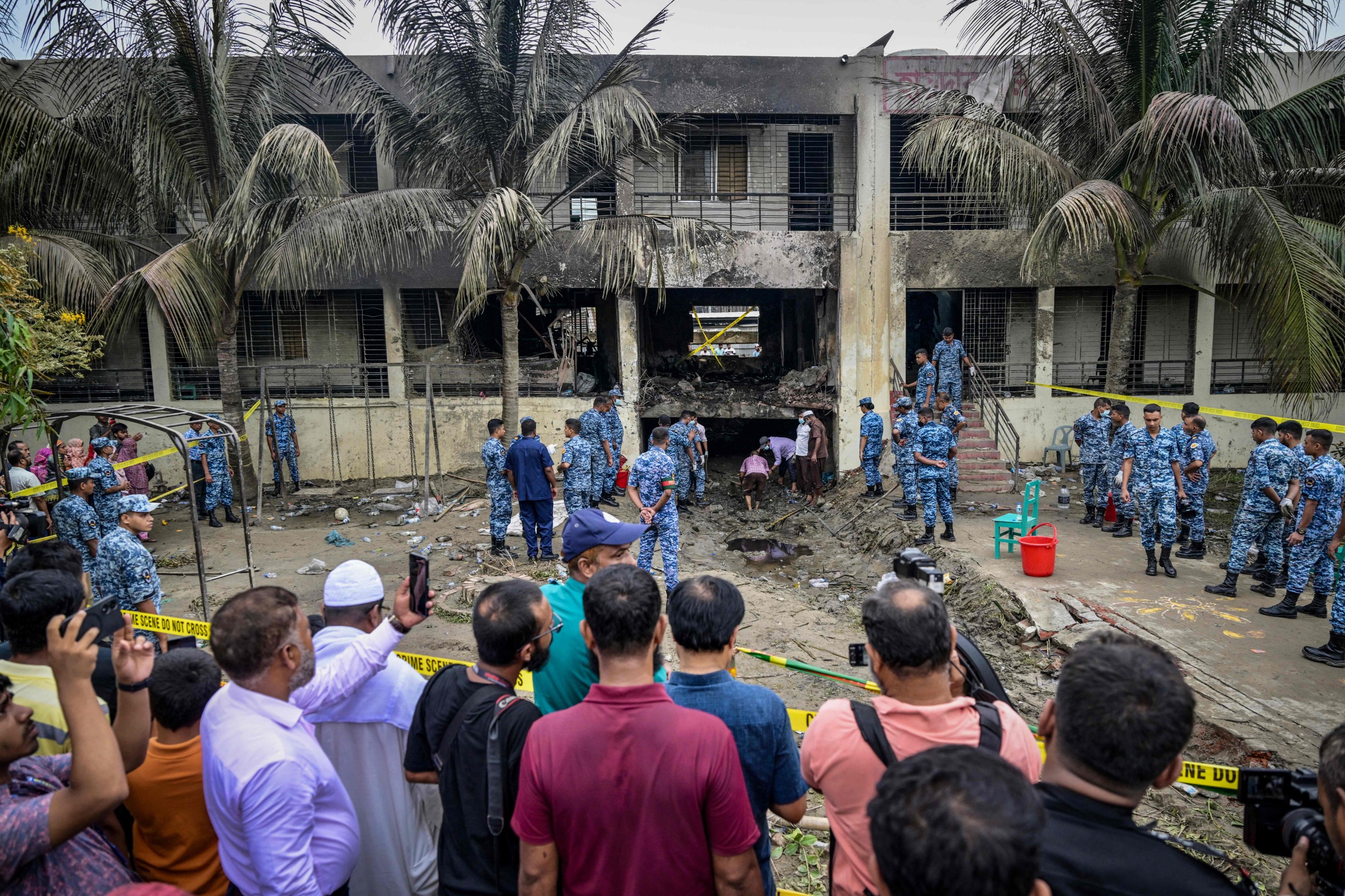 Students protest in Bangladesh after air force jet crash kills 31, mostly children