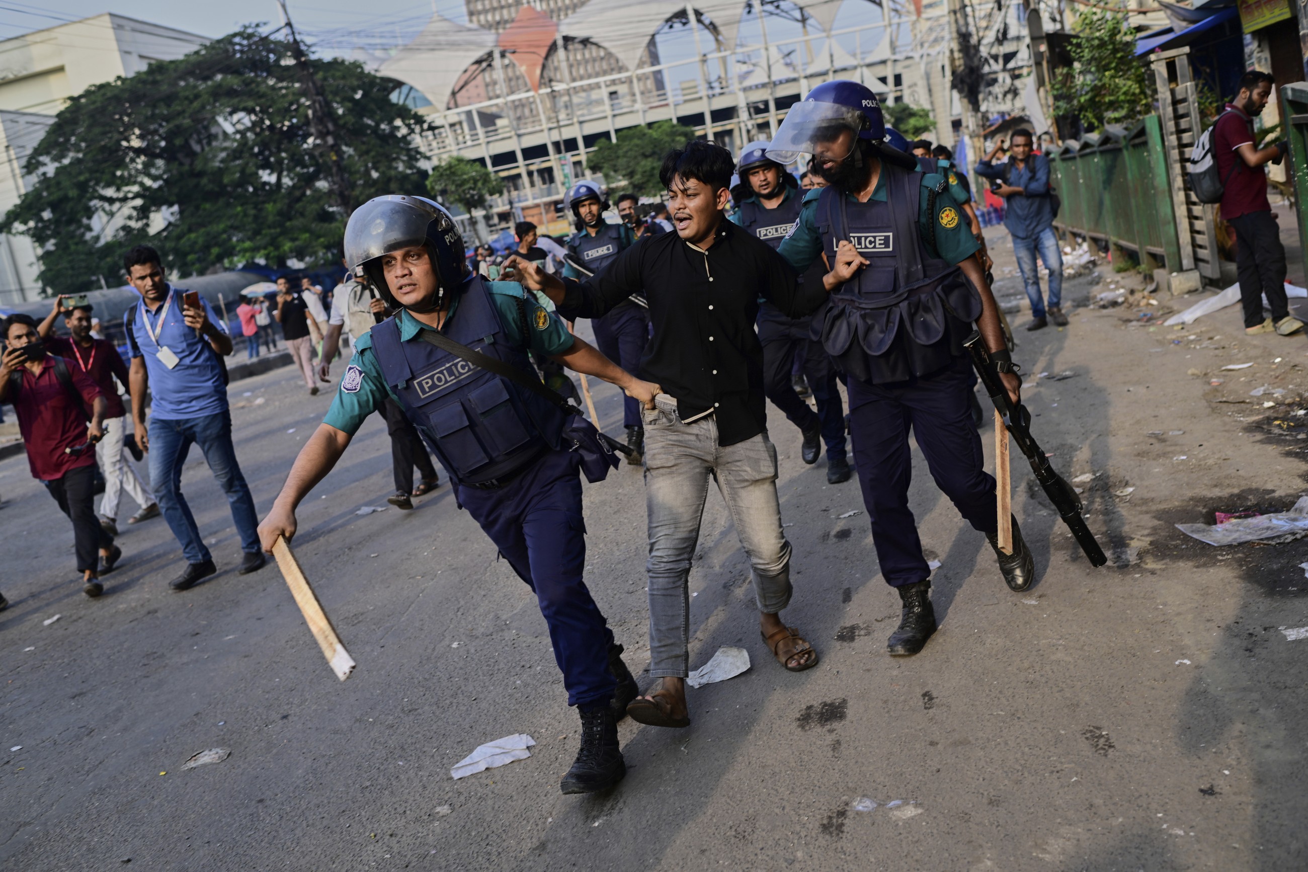 Students protest in Bangladesh after air force jet crash kills 31, mostly children