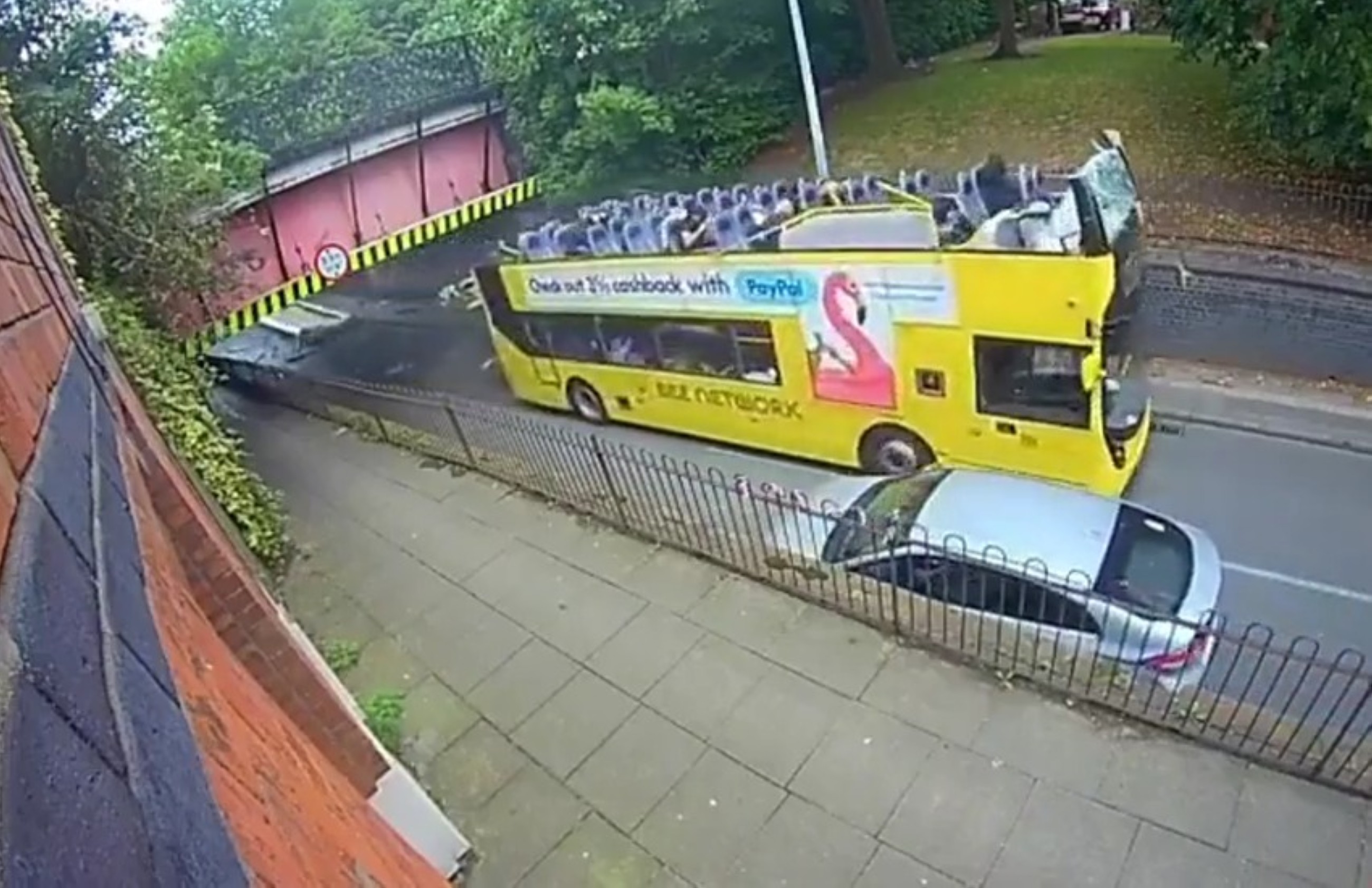 VIDEO: Double-decker bus hits low canal bridge in Manchester, roof torn off