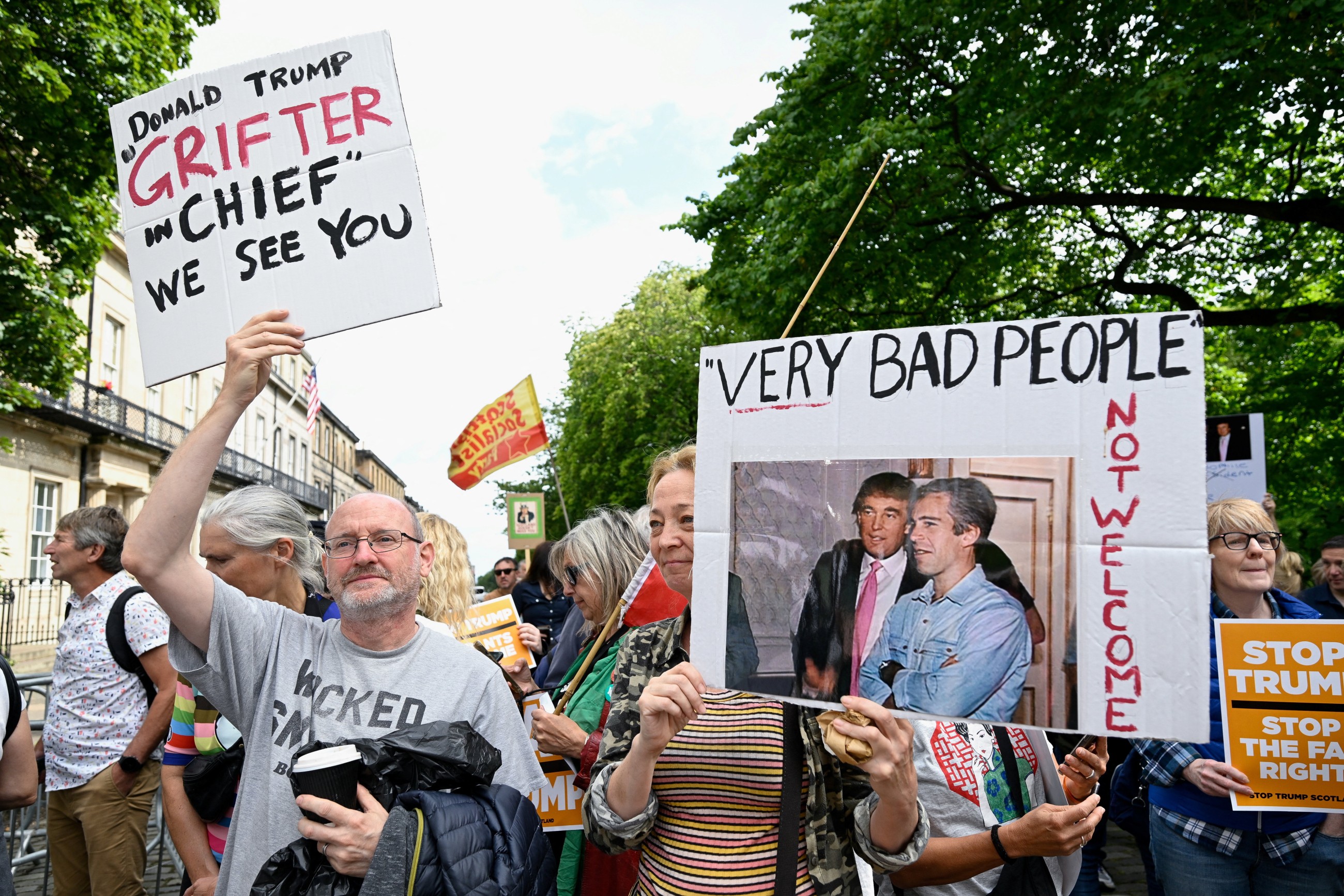 Trump plays golf in Scotland while protesters take to the streets and decry his visit