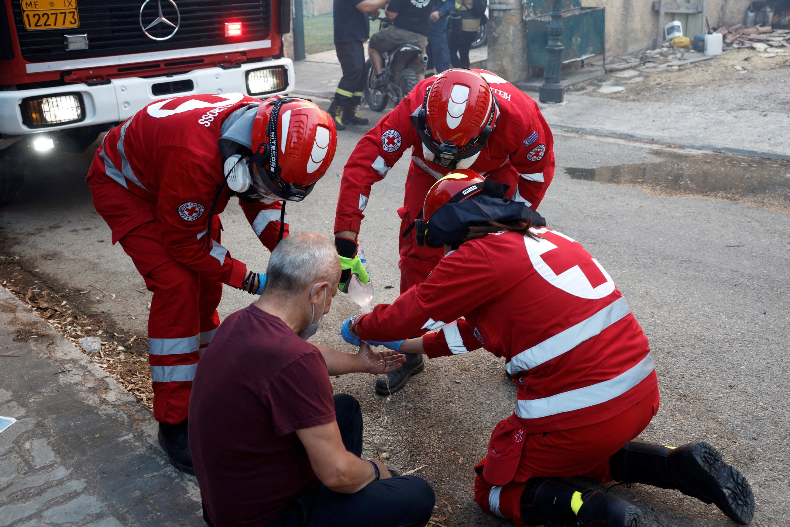 Greece battles wildfires across country, evacuates villages