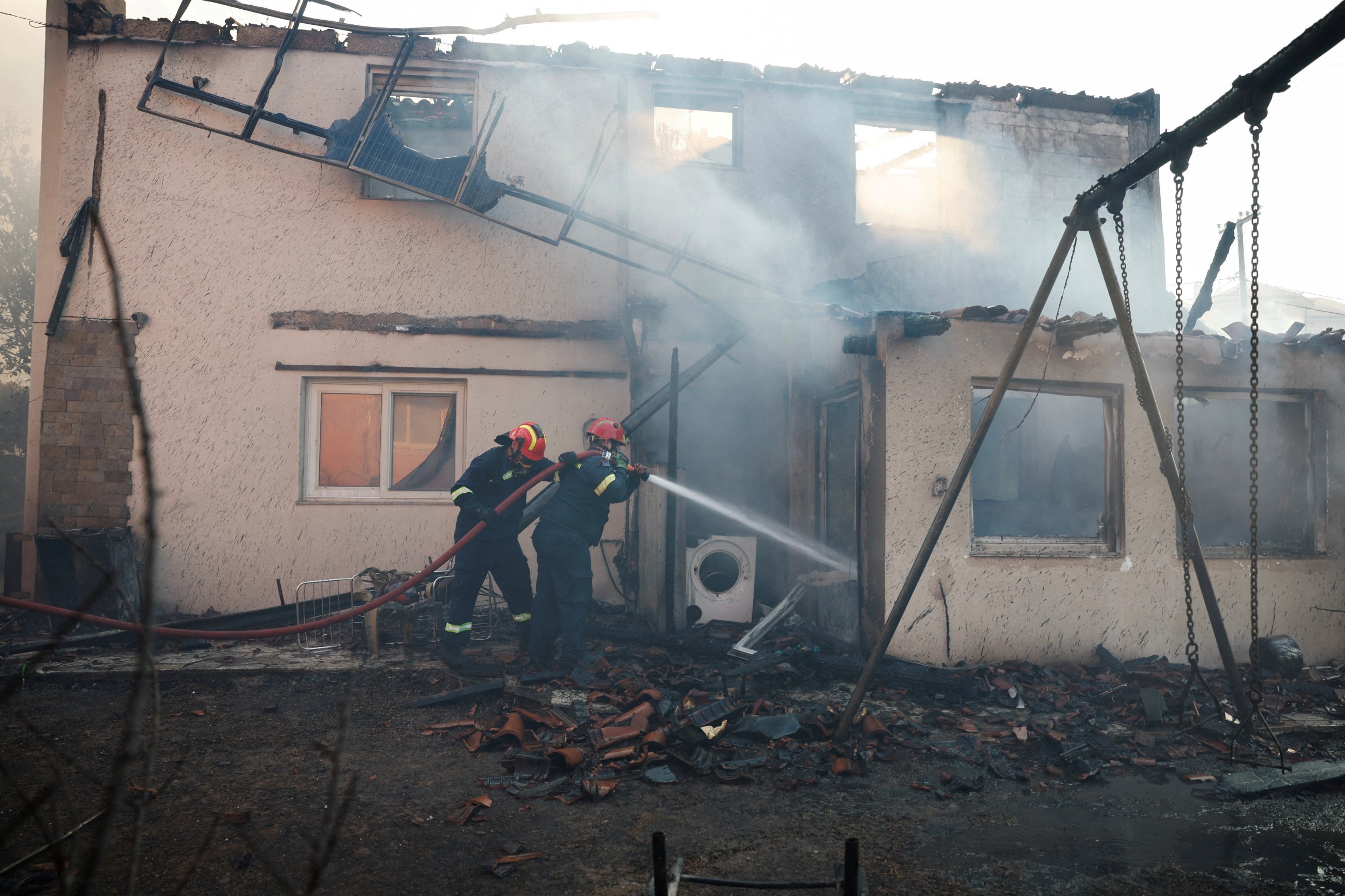Greece battles wildfires across country, evacuates villages