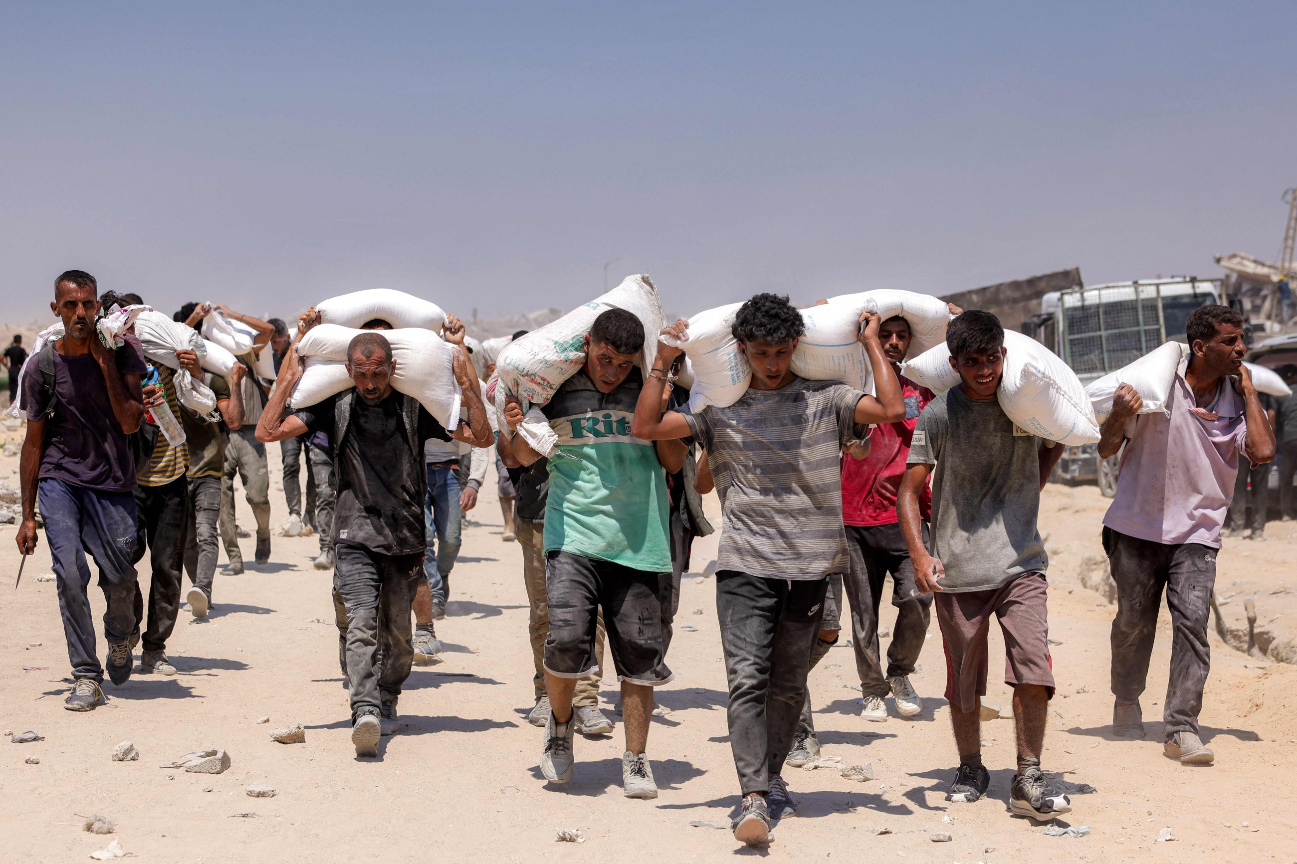 Israel announces daily pauses in Gaza fighting as aid airdrops begin