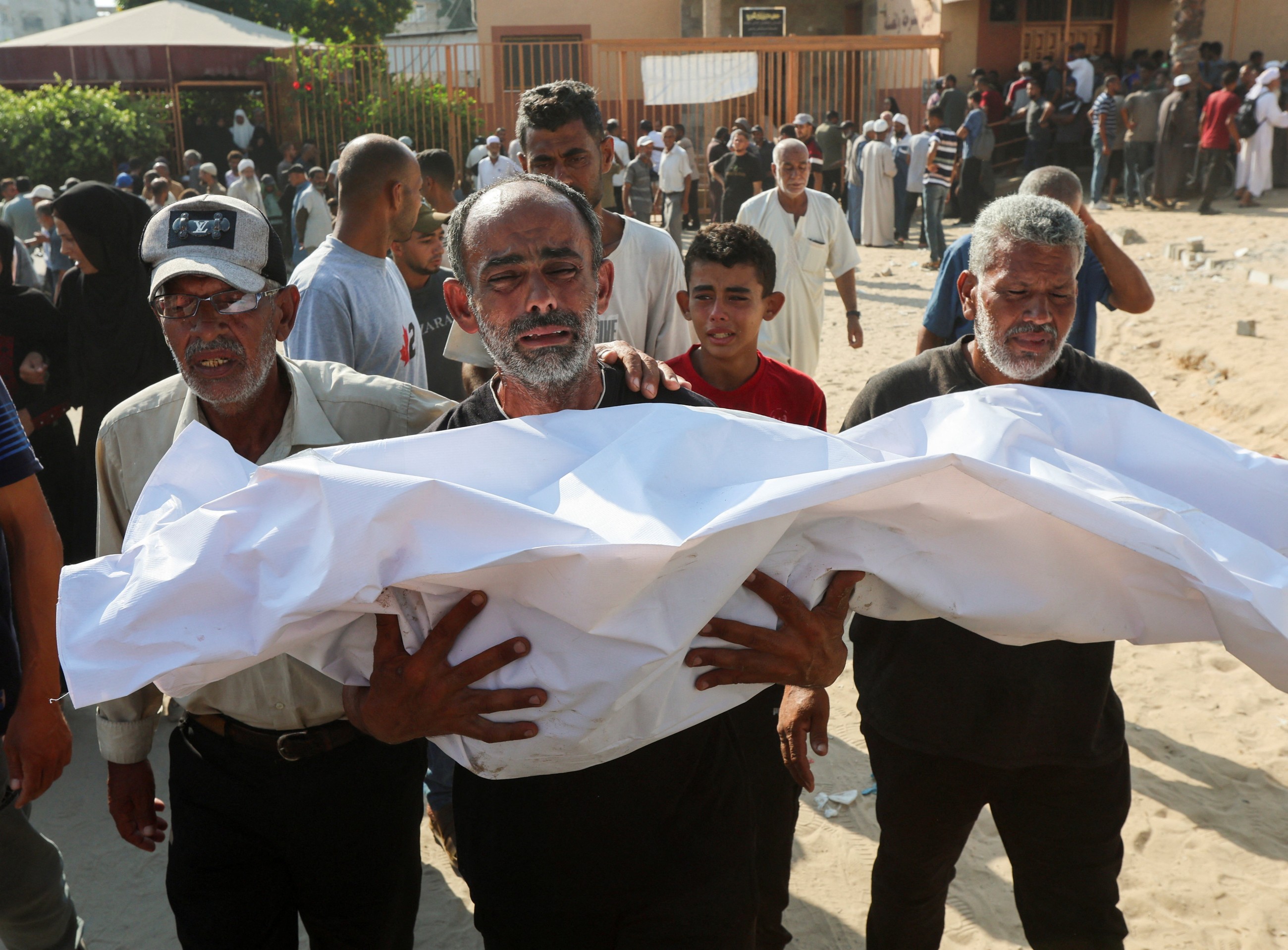 Israeli fire kills 78 more Palestinians in Gaza as aid delivery remains chaotic