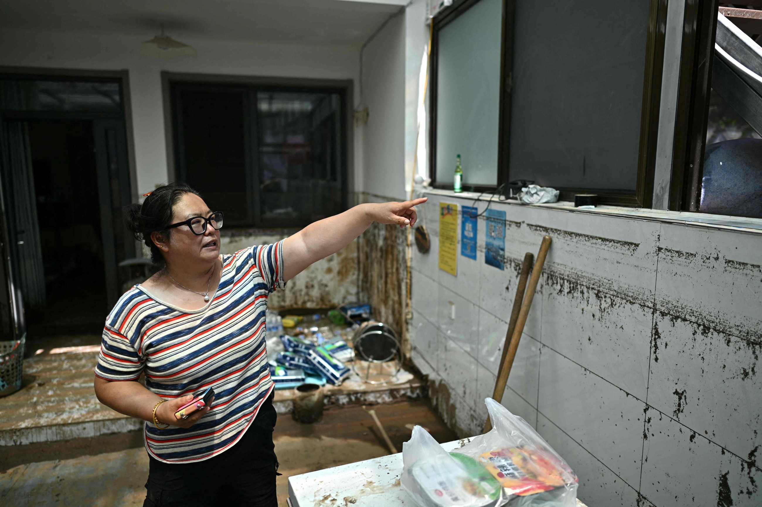 'All gone:' Beijing villagers left with nothing after deadly floods
