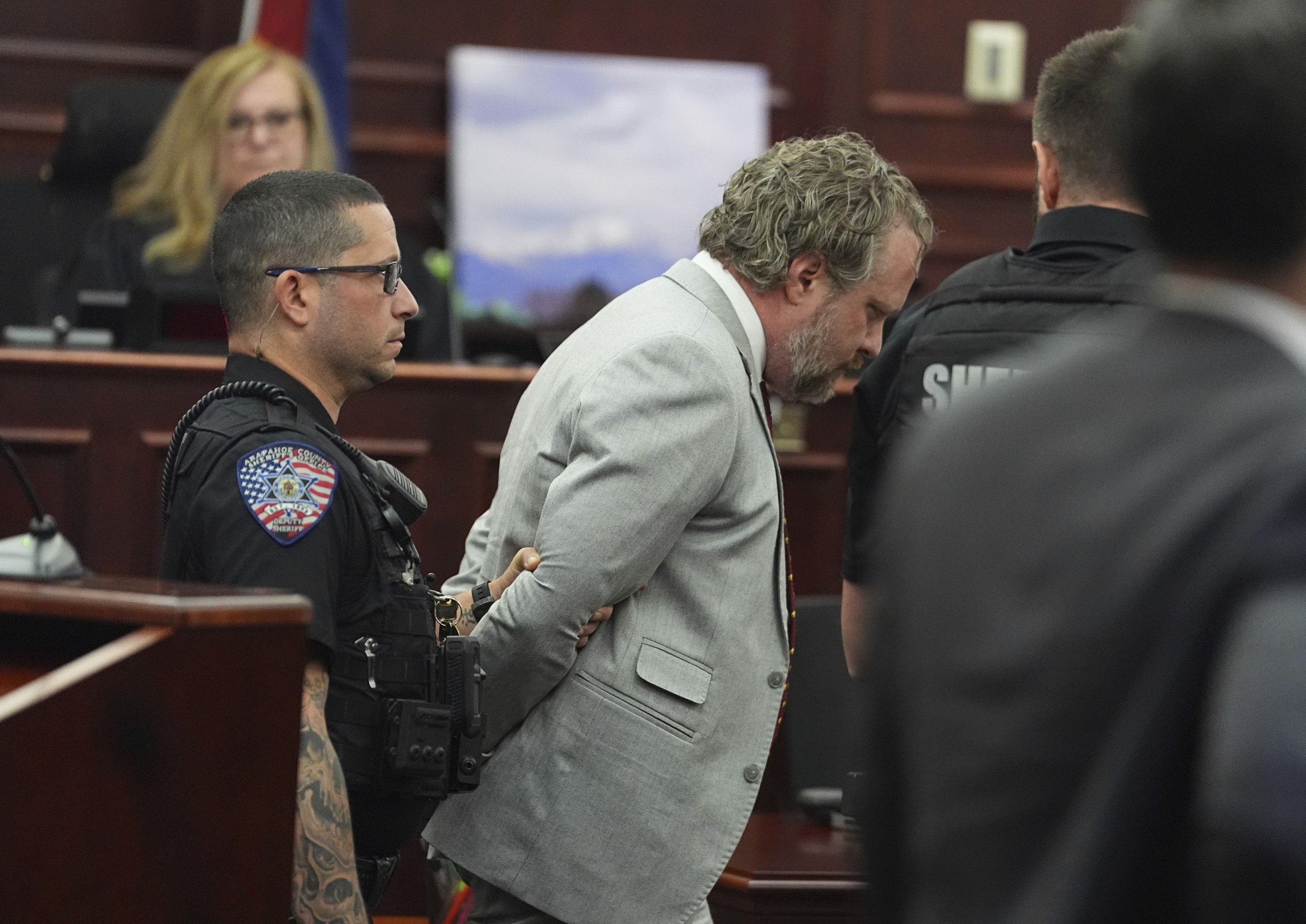 Dentist gets life in prison for poisoning wife's shakes