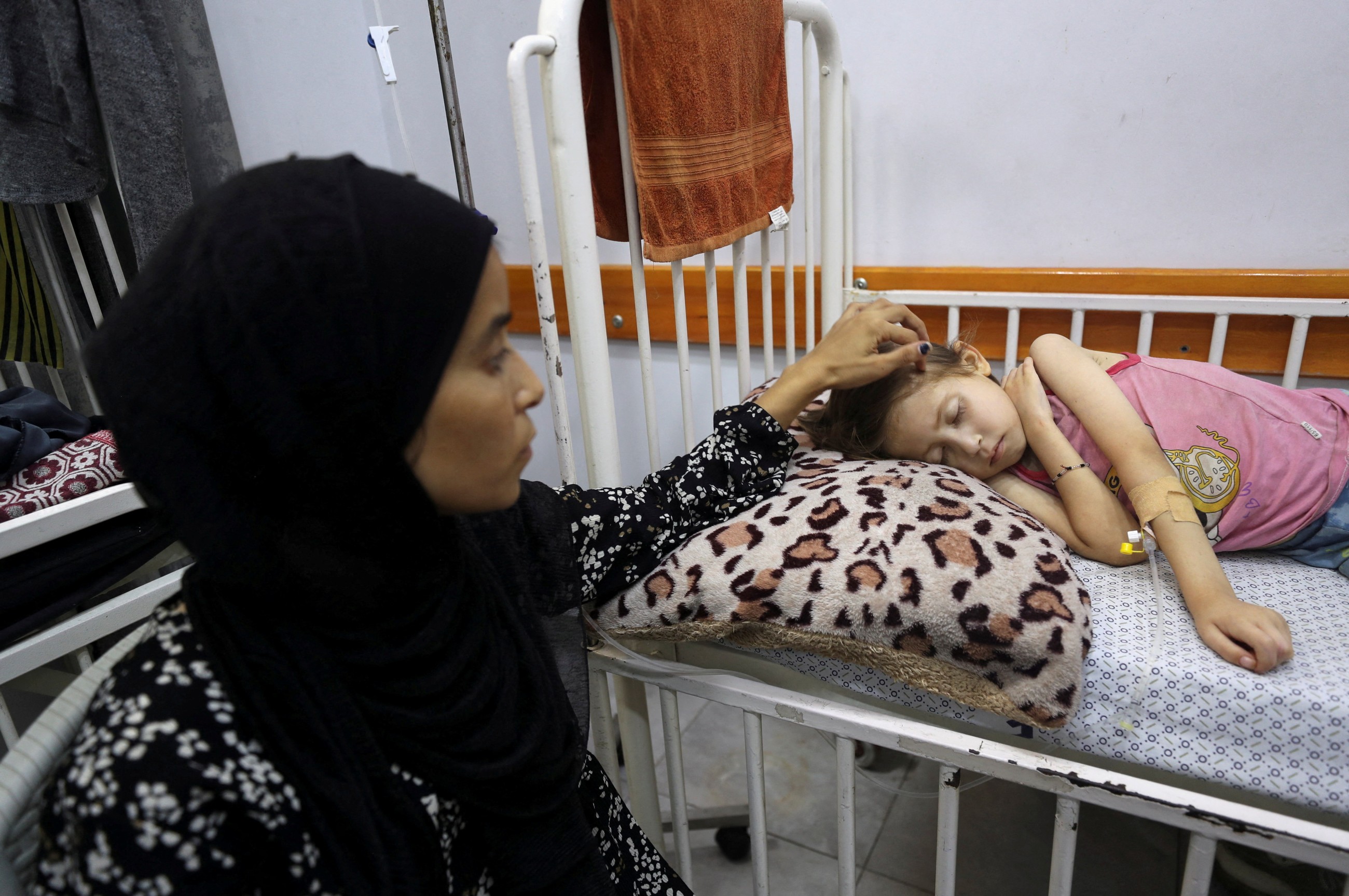Gaza mother worries time running out for evacuation of malnourished daughter