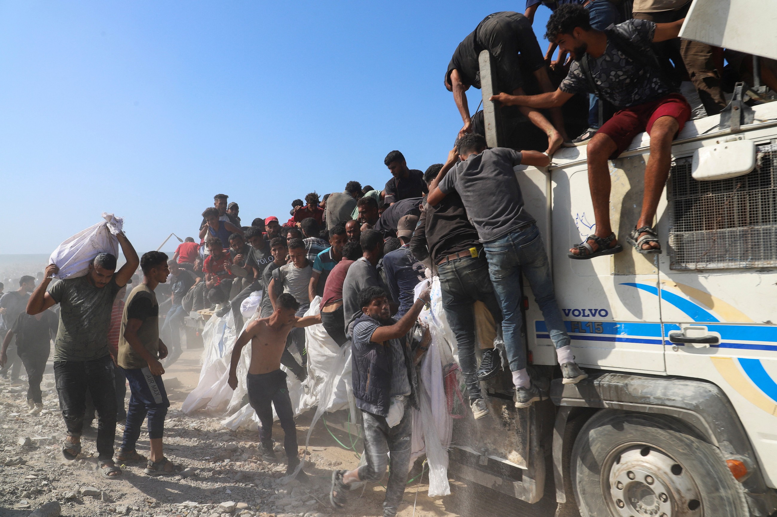 Hamas says it will allow aid for hostages if Israel halts airstrikes