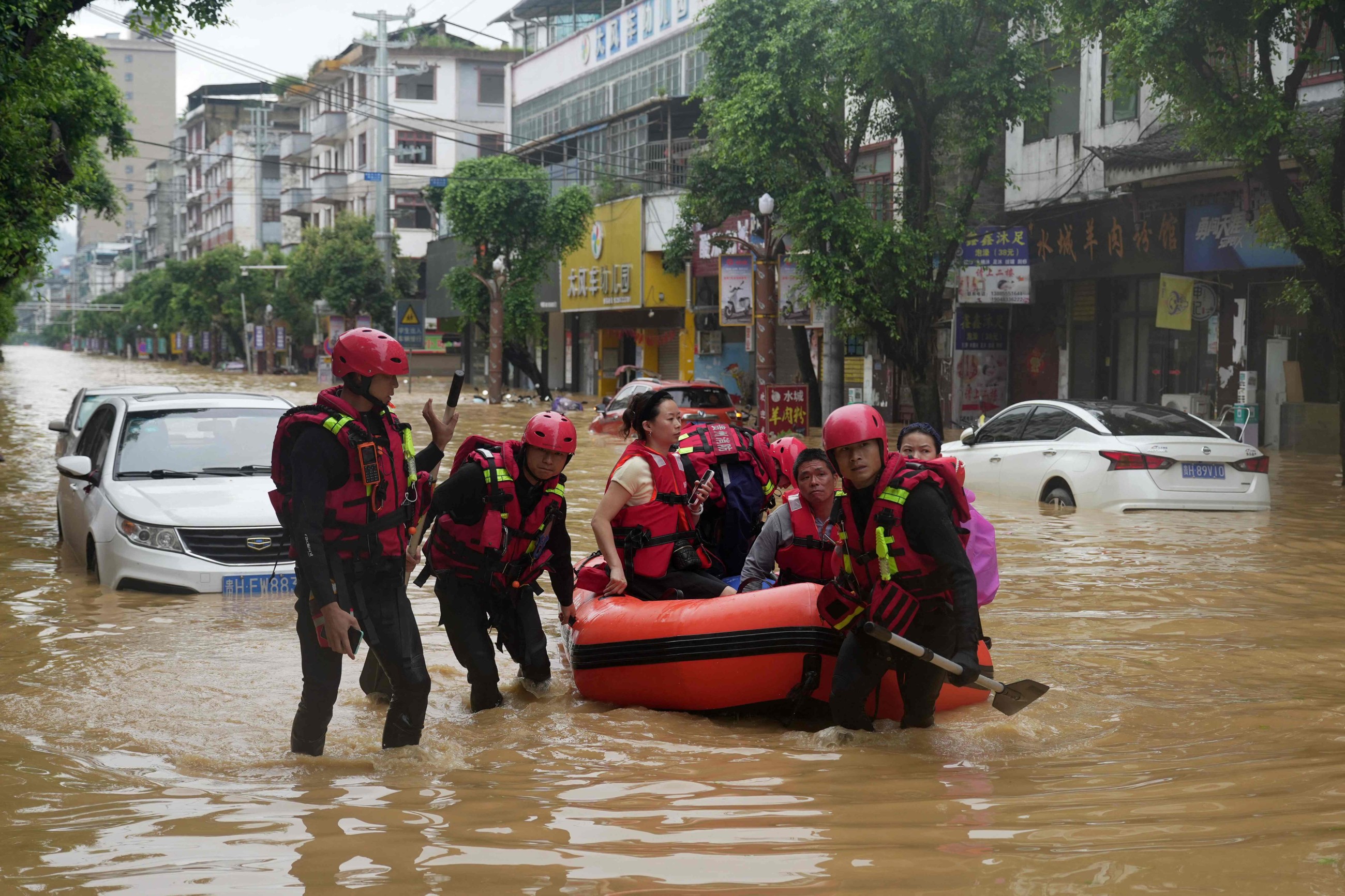 Beijing issues new storm warning after deadly floods