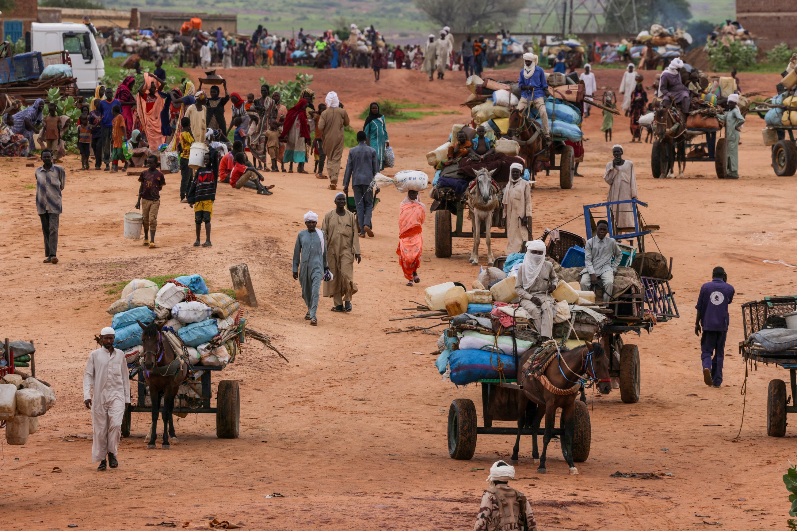 Sudan paramilitaries kill 14 civilians fleeing besieged city