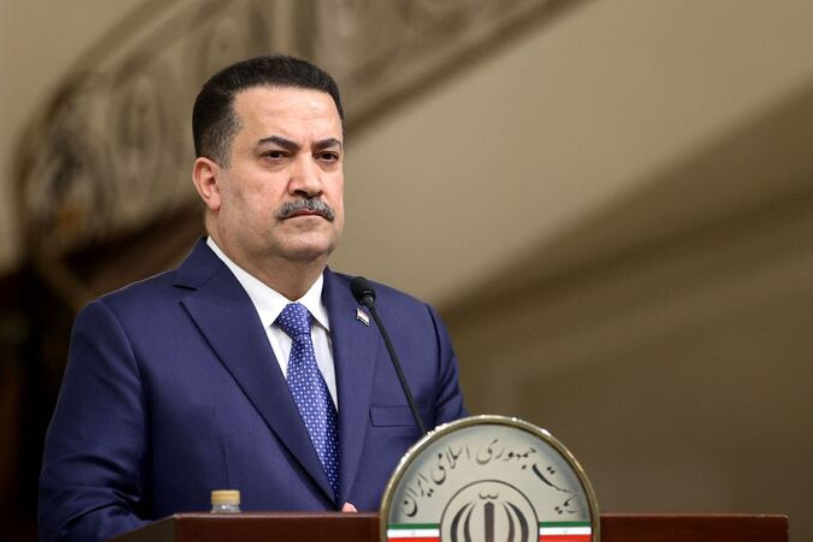 Iraqi prime minister removes paramilitary commanders after deadly clash with police