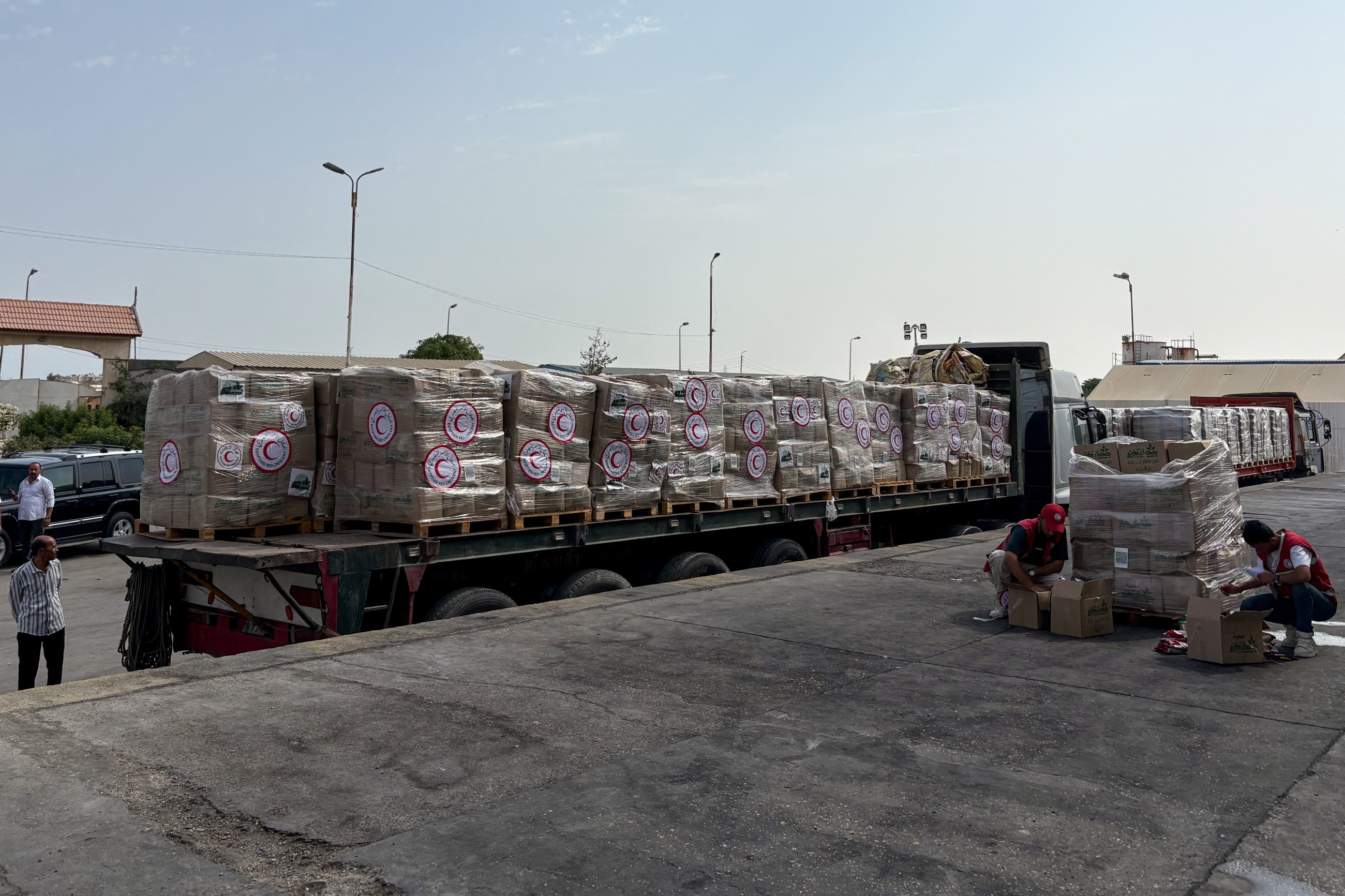 Turned back from Gaza by Israel, aid shipments languish in warehouses, on roadsides