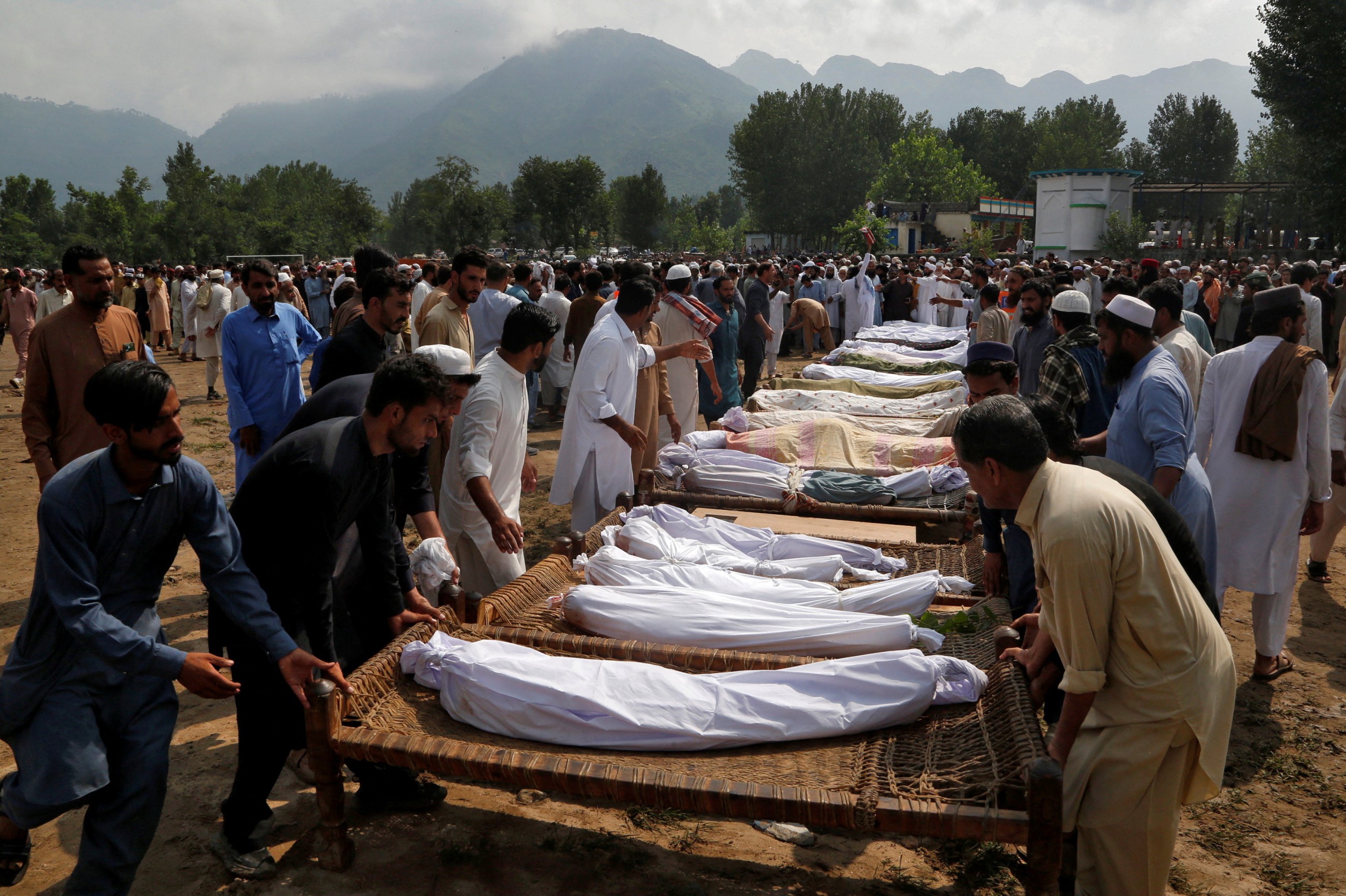 Hopes for survivors wane as landslides, flooding bury Pakistan villages
