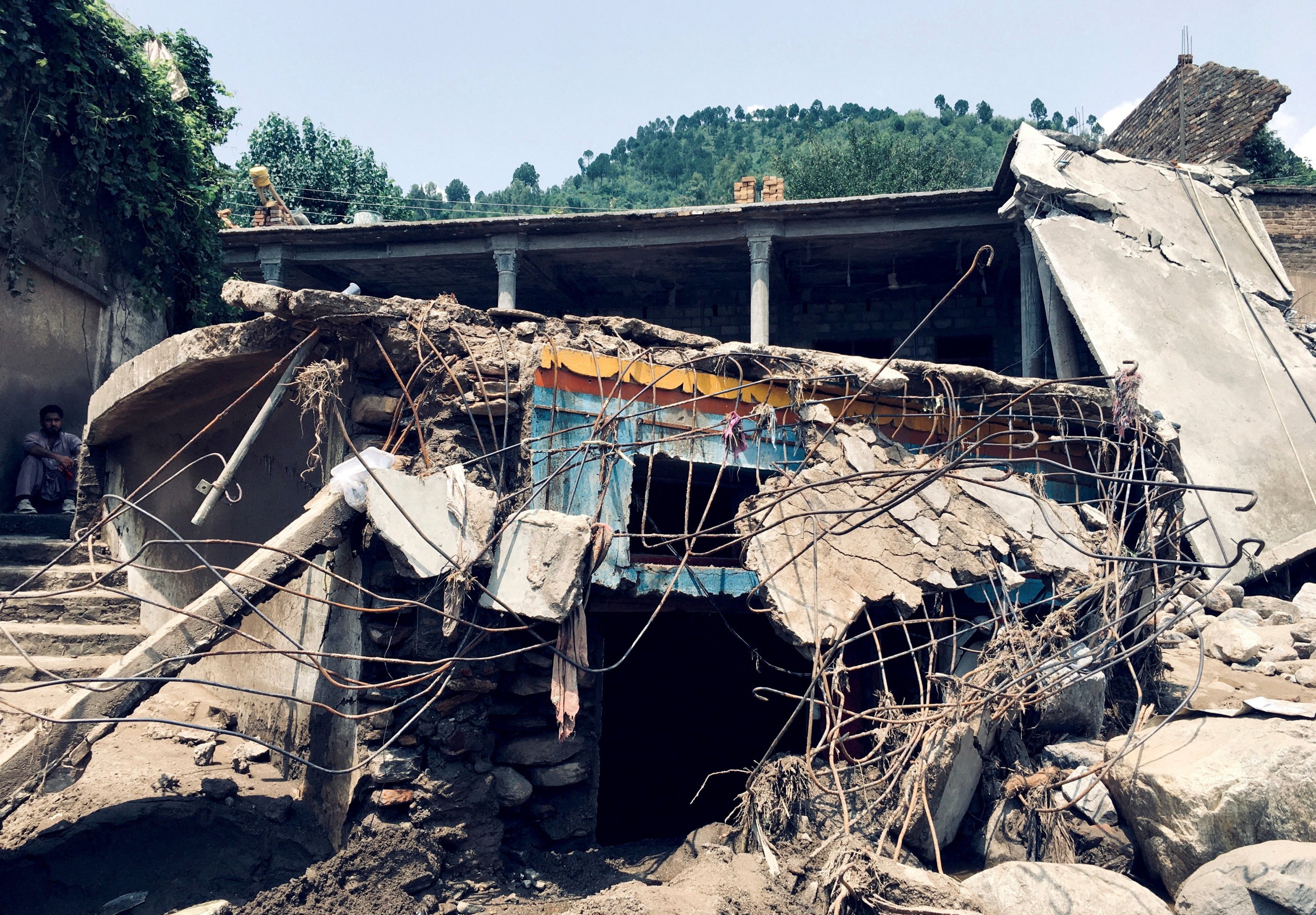 Hopes for survivors wane as landslides, flooding bury Pakistan villages