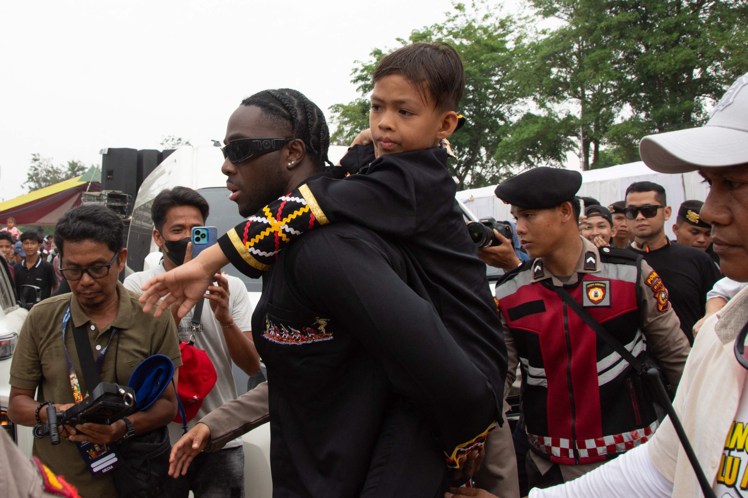 Indonesian child’s viral fame draws tourists