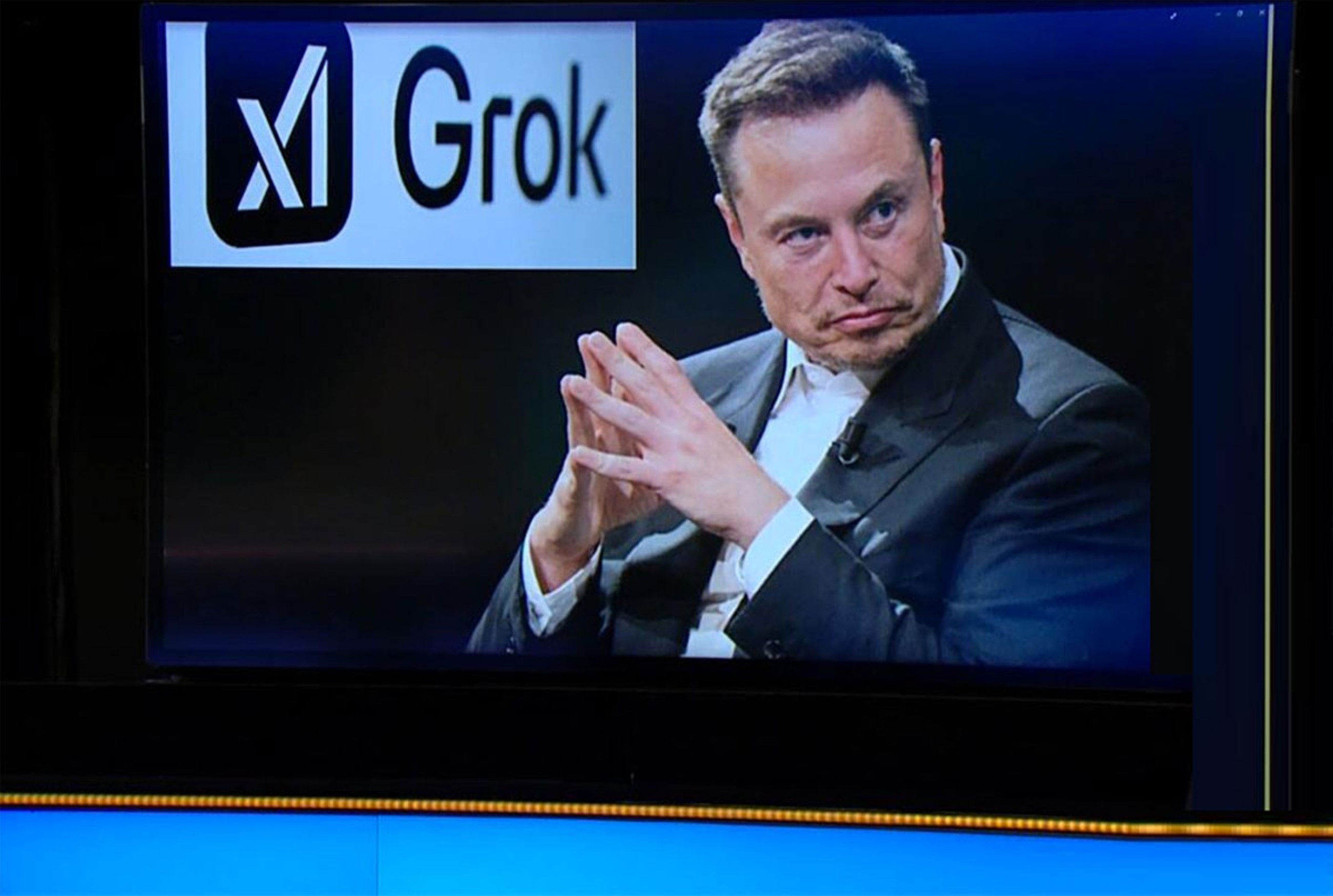 Musk accuses Apple of 'conspiring' to suppress AI chatbot Grok