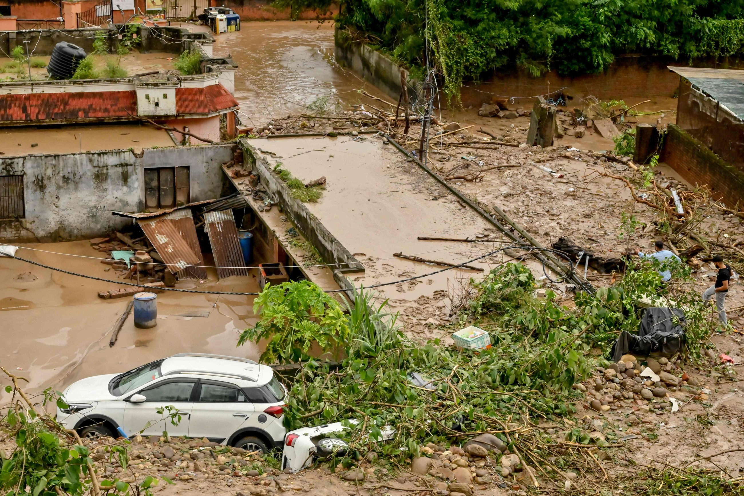 Flash floods leave 34 dead in Kashmir as over 200,000 displaced in Pakistan