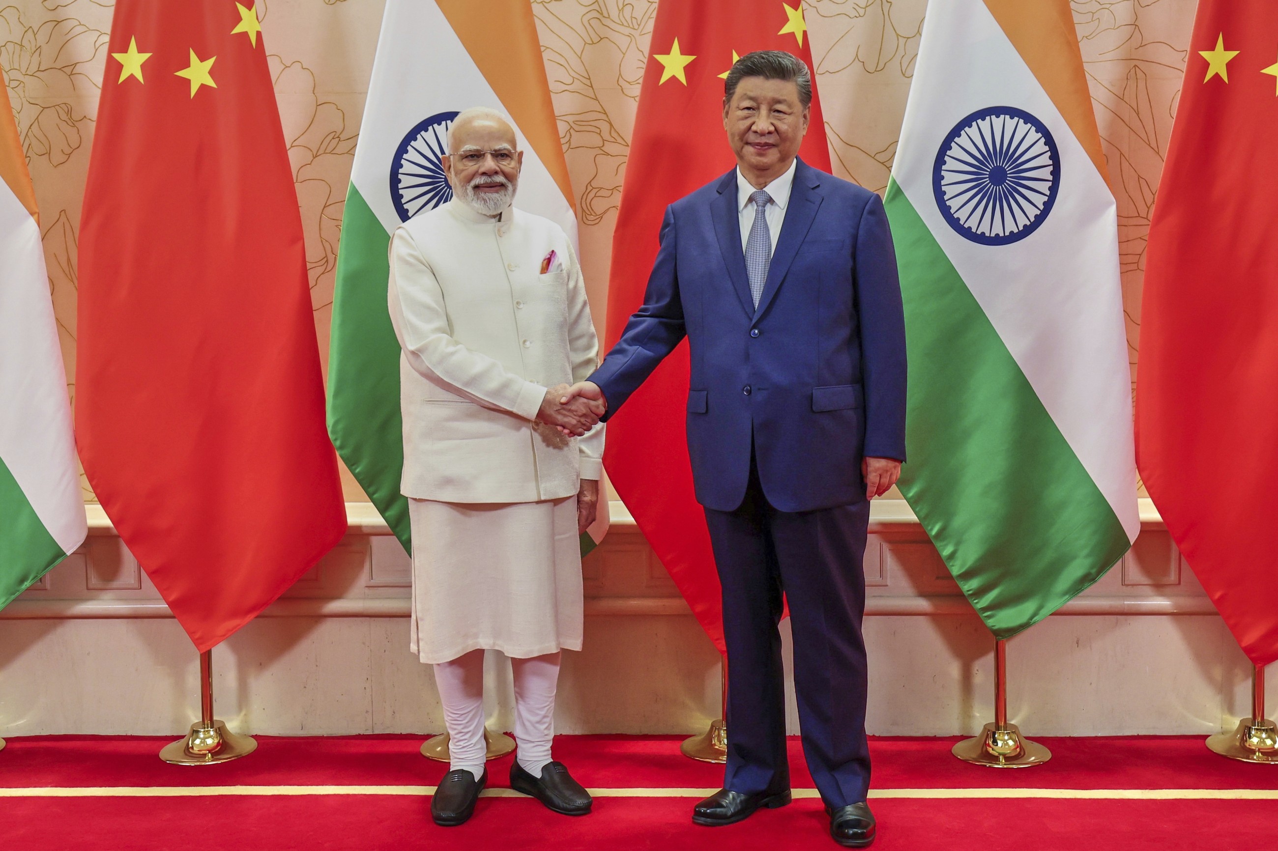 Putin and Modi in China for summit hosted by Xi