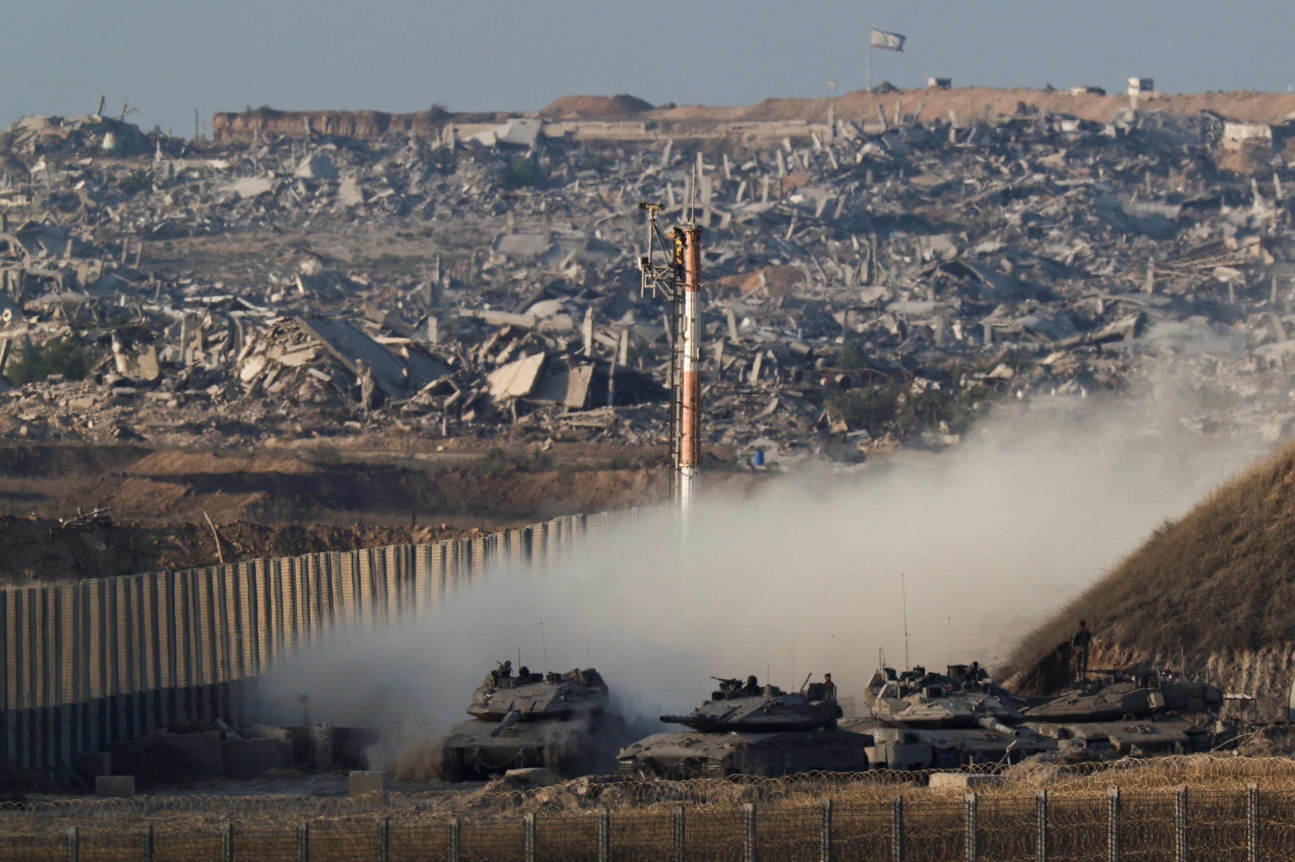 Israel sends tanks deeper into Gaza City, more families flee