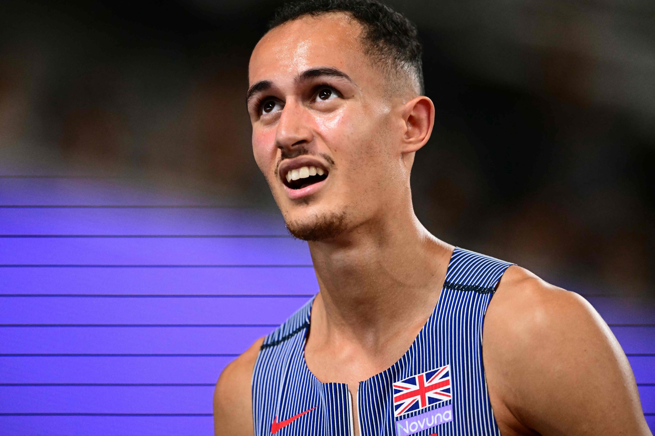 Singing British hurdler Donovan in tune on world debut