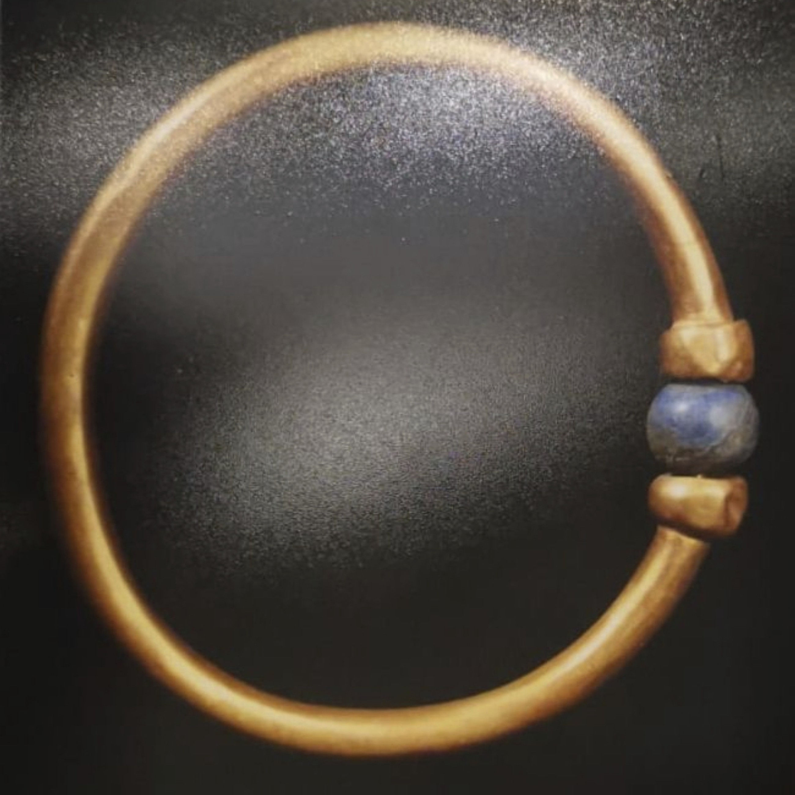 This undated photo provided by Egypt's Ministry of Tourism and Antiquities shows a 3,000-year-old bracelet that belonged to an ancient pharaoh.
