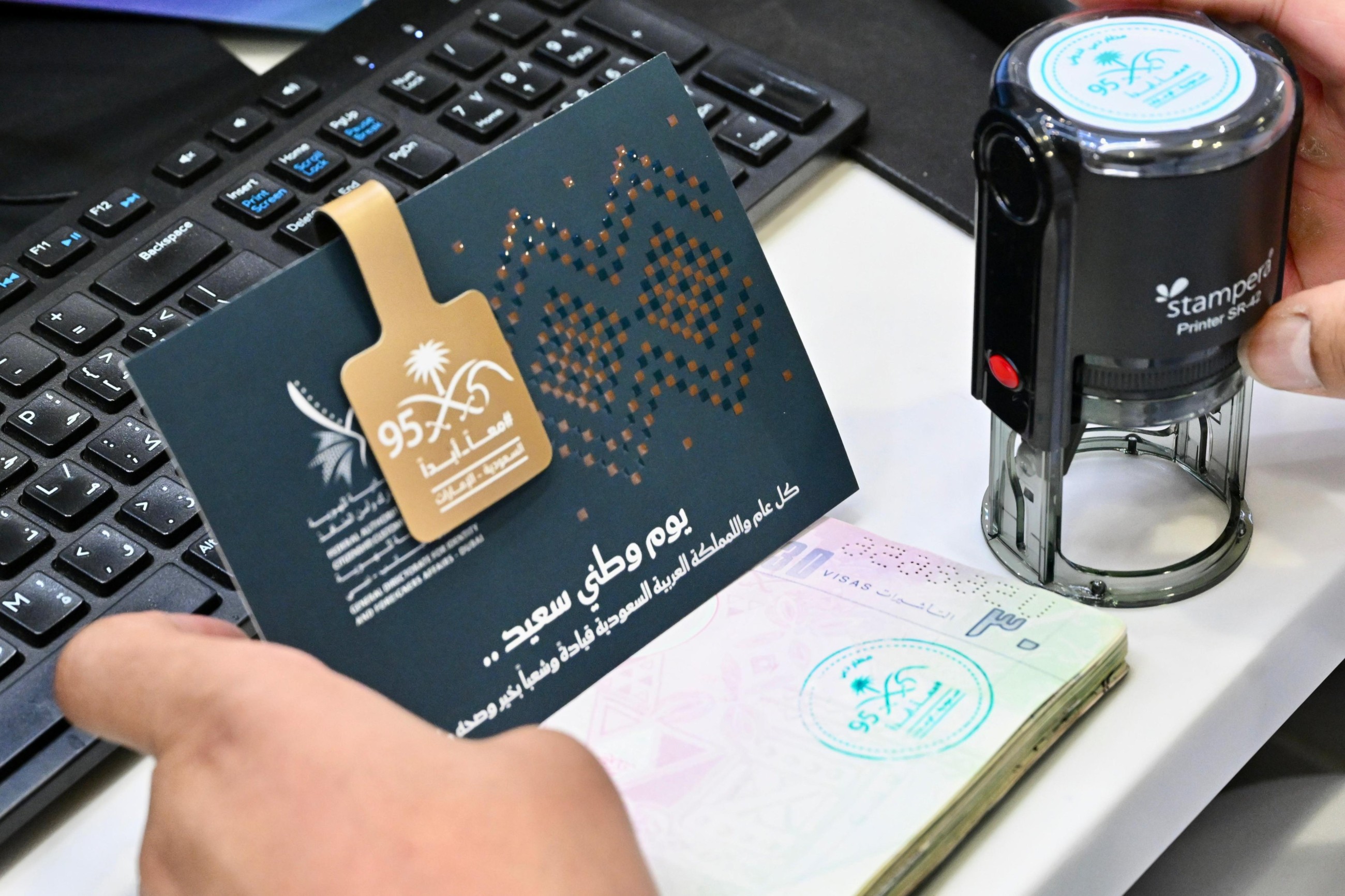 Dubai airport marks Saudi Arabia’s 95th National Day with passport stamps, festivities