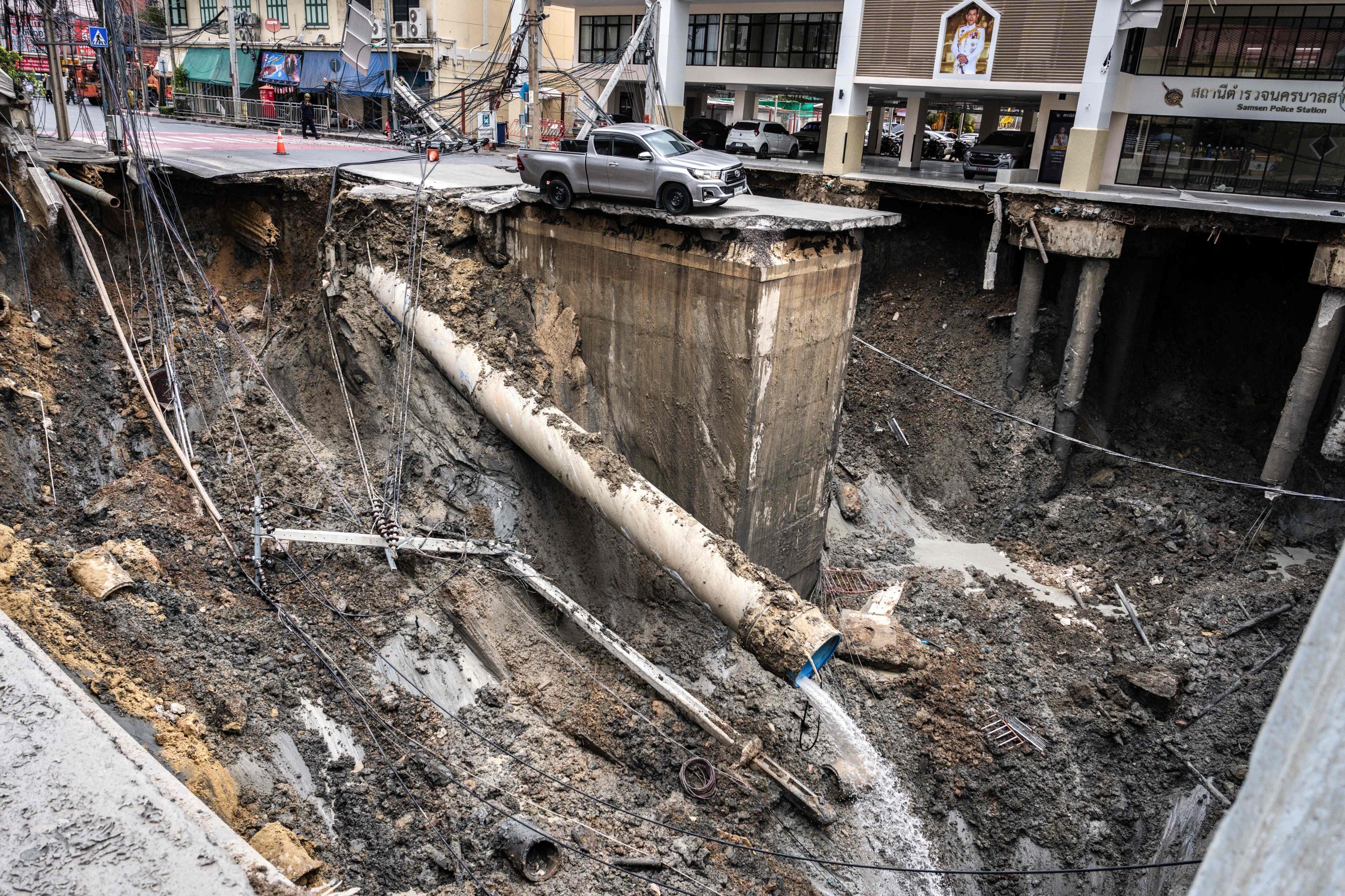 Massive sinkhole in Bangkok street forces evacuations