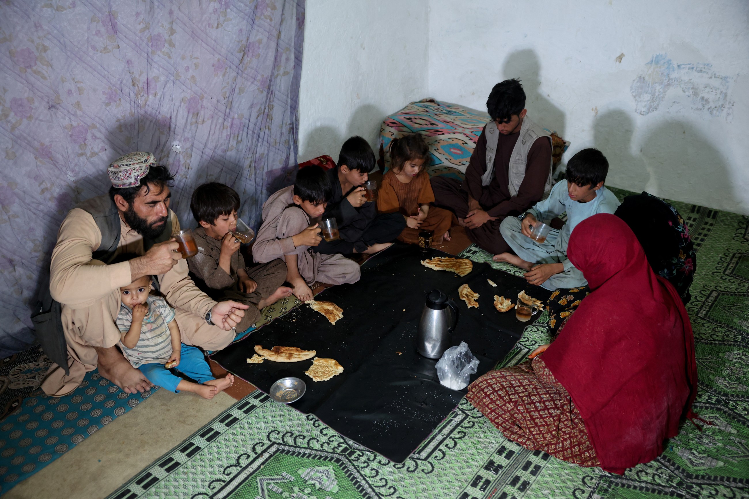 Water is life: Afghan capital's wells run dry, driving children out of class and into water queues