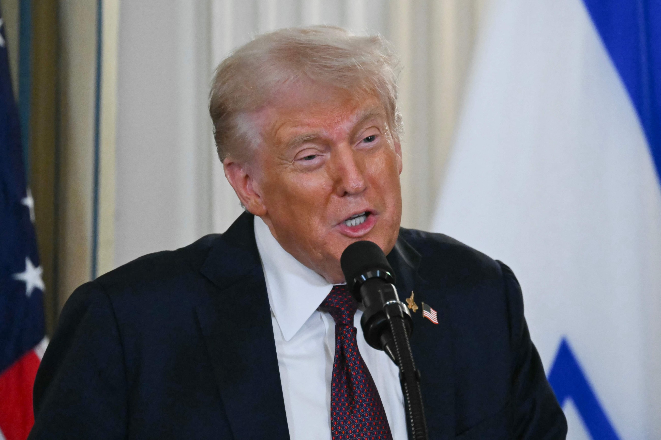 Trump says Israel to withdraw from Gaza 'in phases' under deal