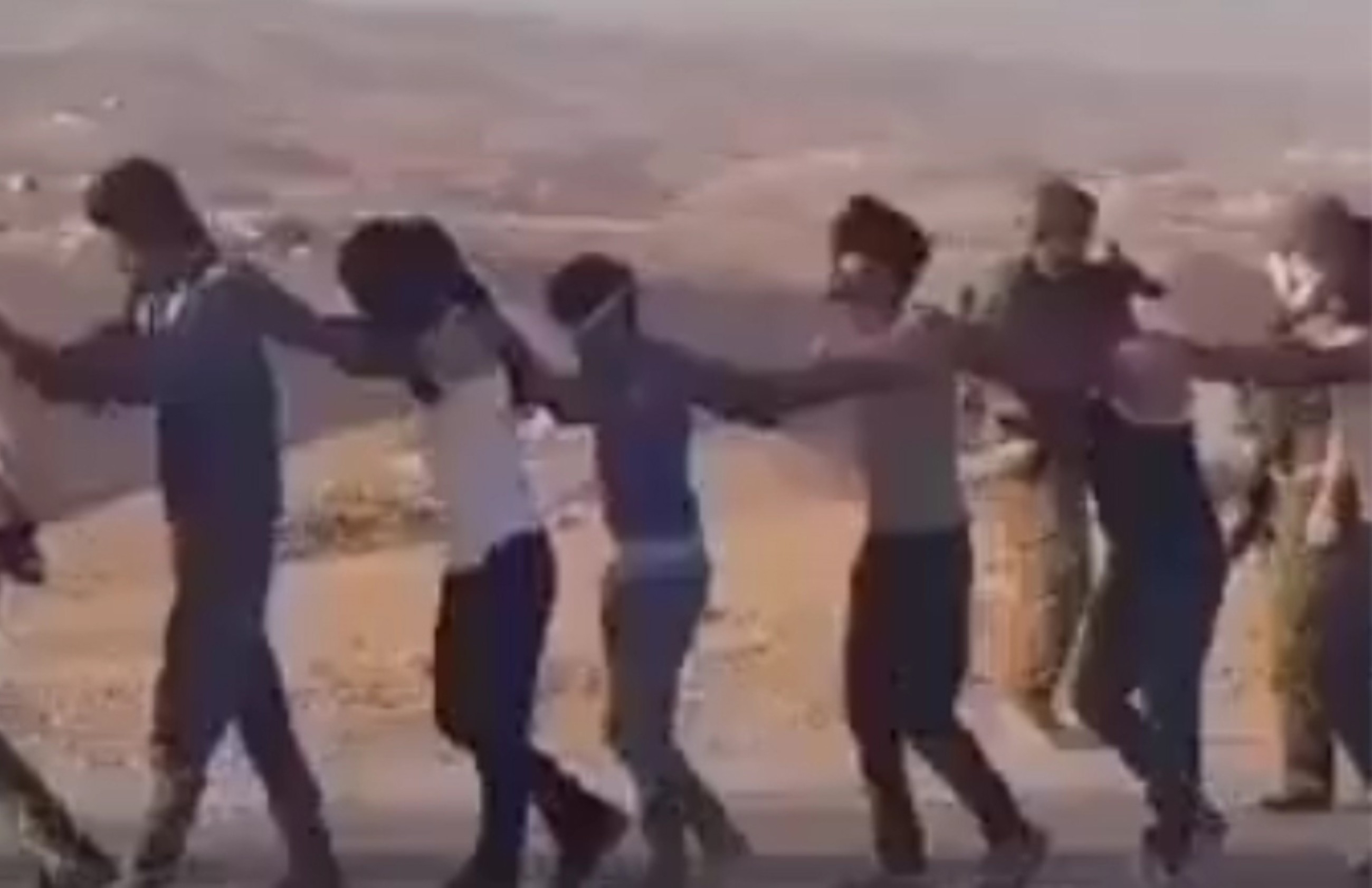 A videograb shows Israeli army detaining Palestinians in Zuweidin, Masafer Yatta, south of Hebron, West Bank.