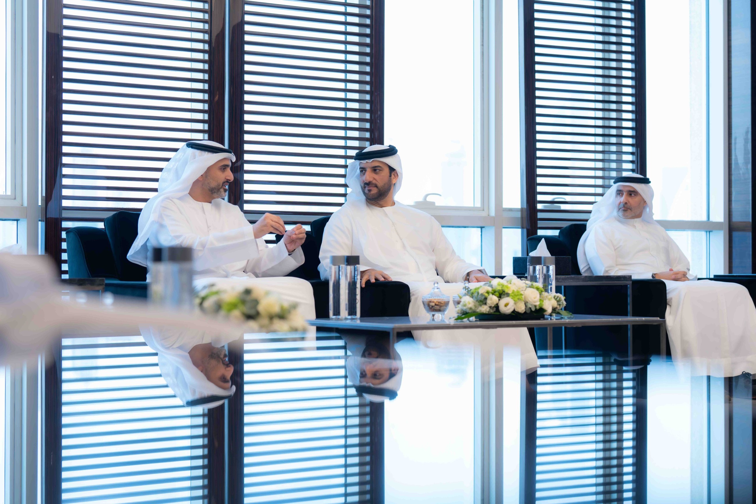 Sultan Bin Ahmed, e& officials discuss joint cooperation