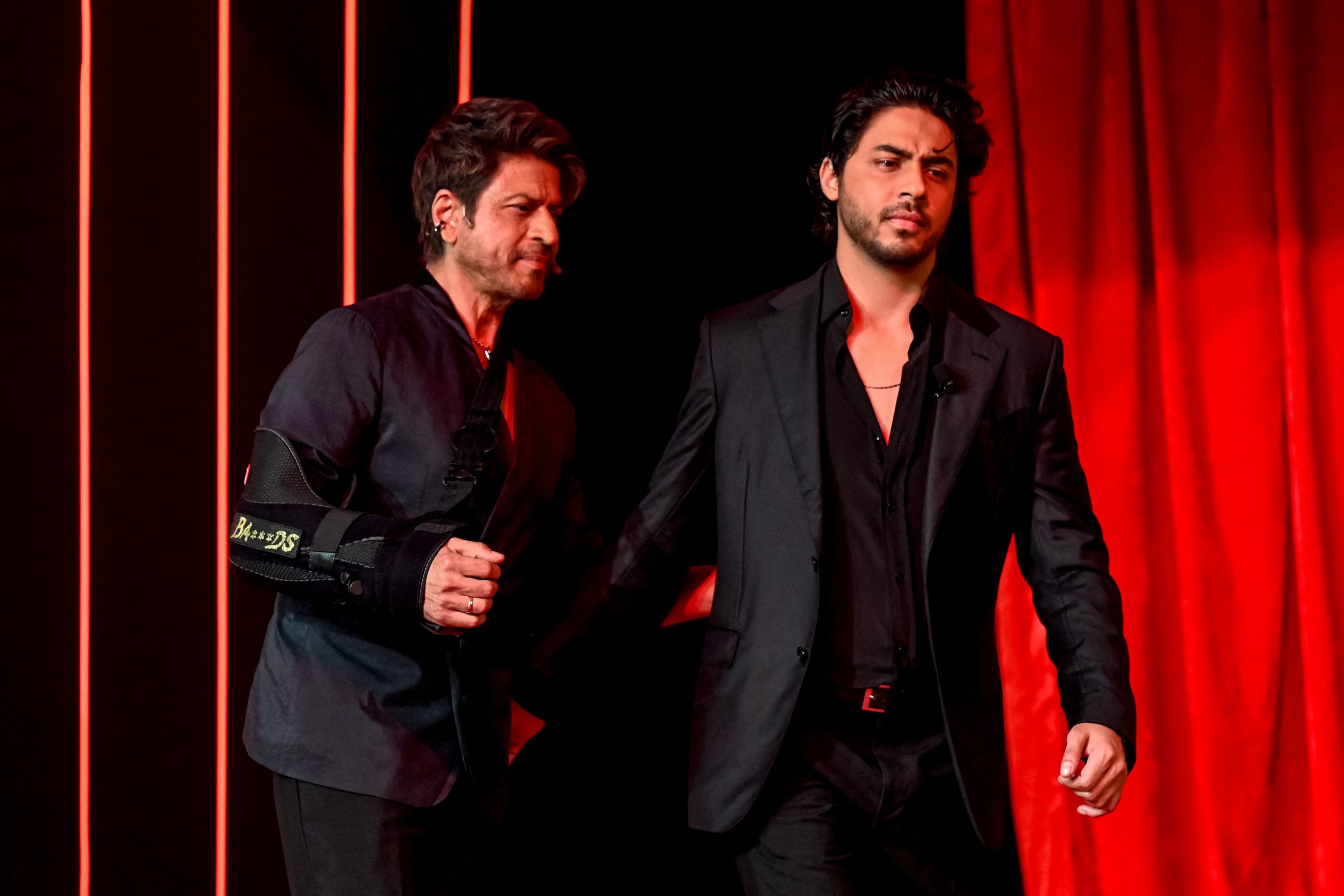 Bollywood actor Shah Rukh Khan and his son Aryan Khan arrive to attend the preview of Netflix's series 'The Ba***ds of Bollywood’ in Mumbai.