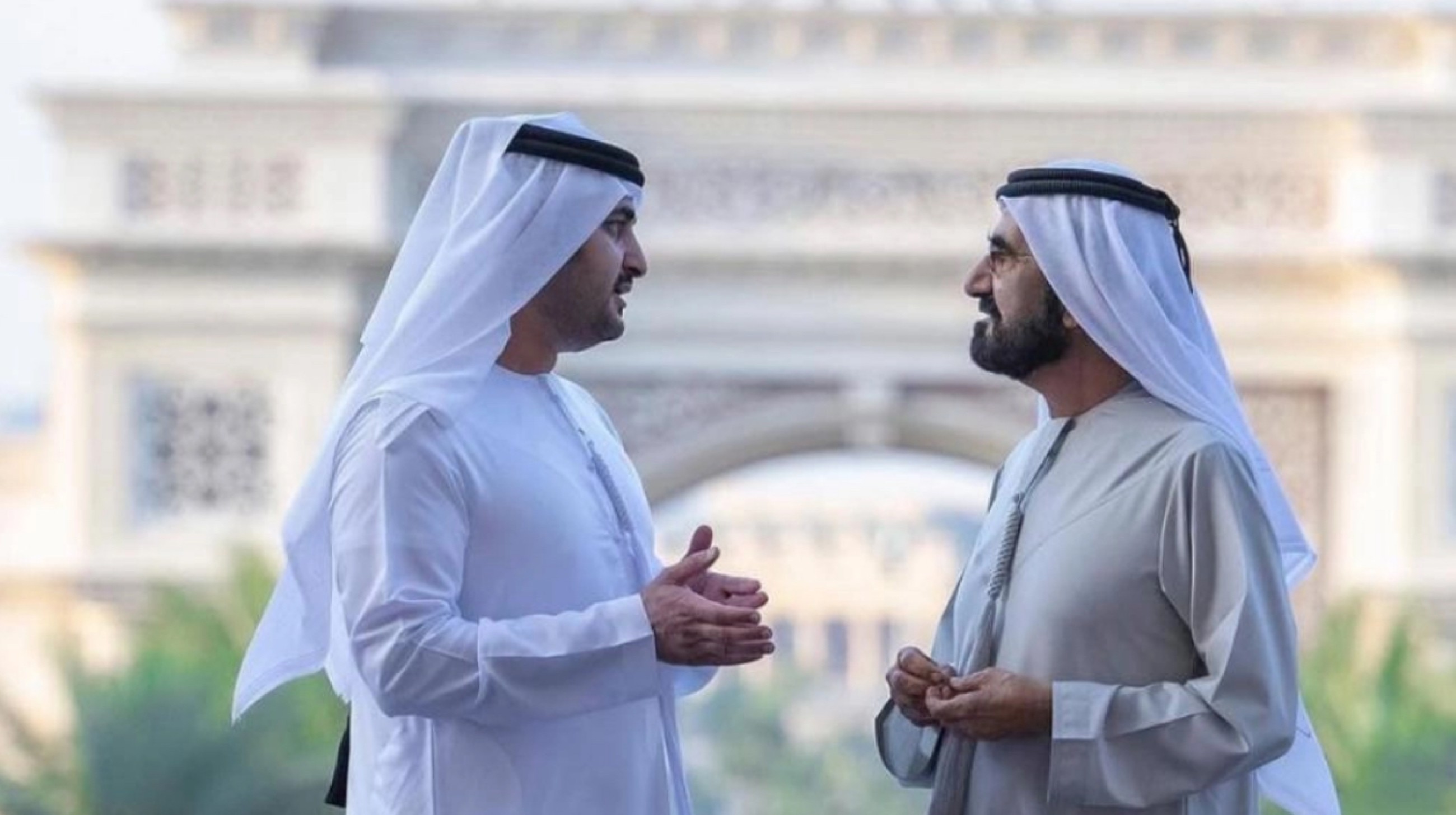 Sheikh Mohammed talks with his son Sheikh Maktoum in Dubai.