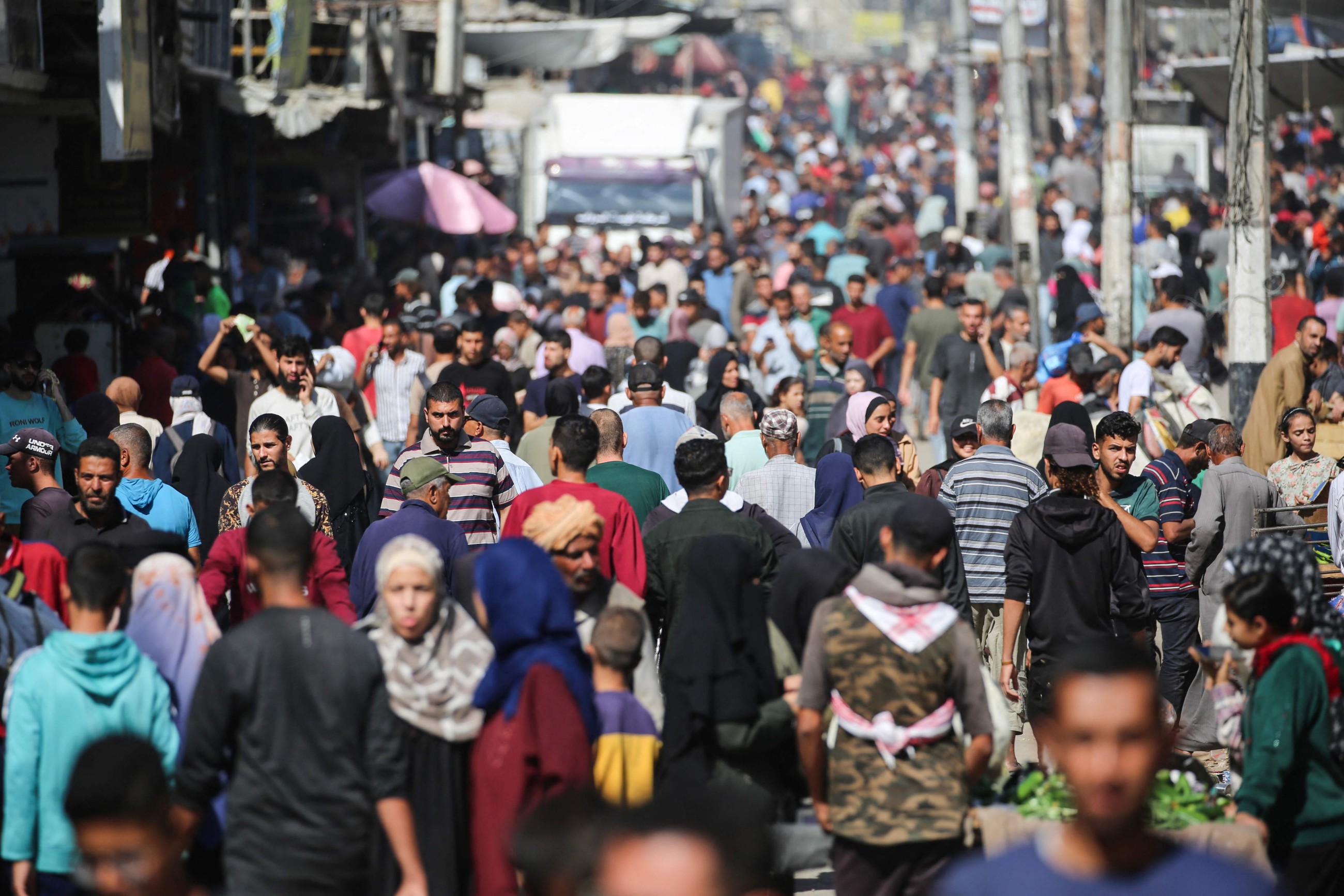Aid trucks roll into Gaza as dispute over hostage bodies is paused