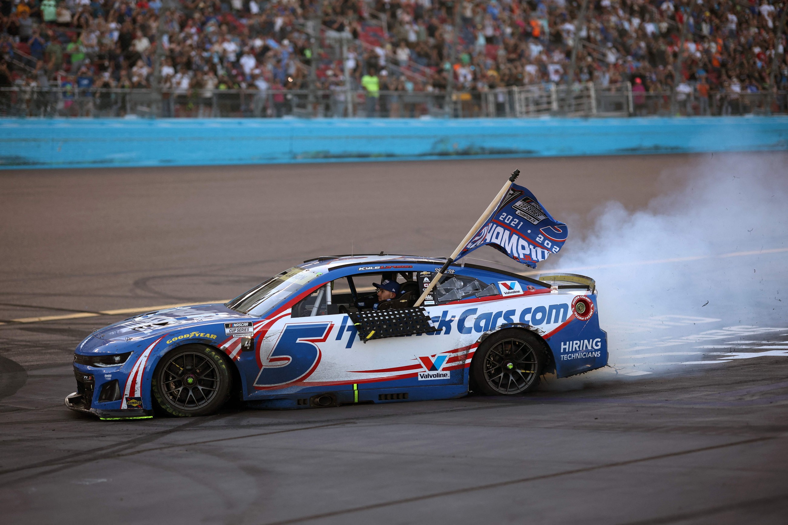 Kyle Larson wins second NASCAR championship, denying Denny Hamlin in overtime