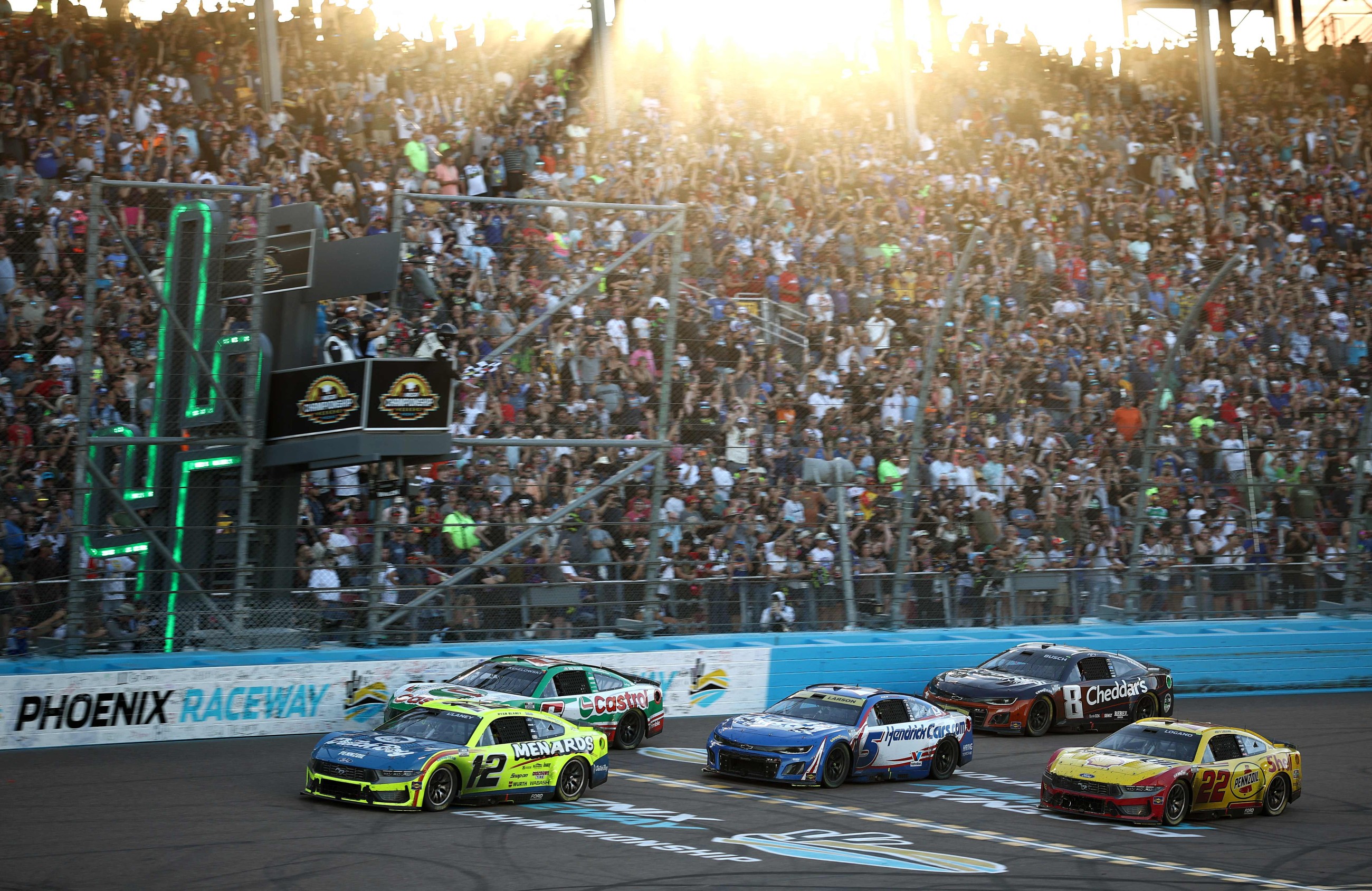 Kyle Larson wins second NASCAR championship, denying Denny Hamlin in overtime