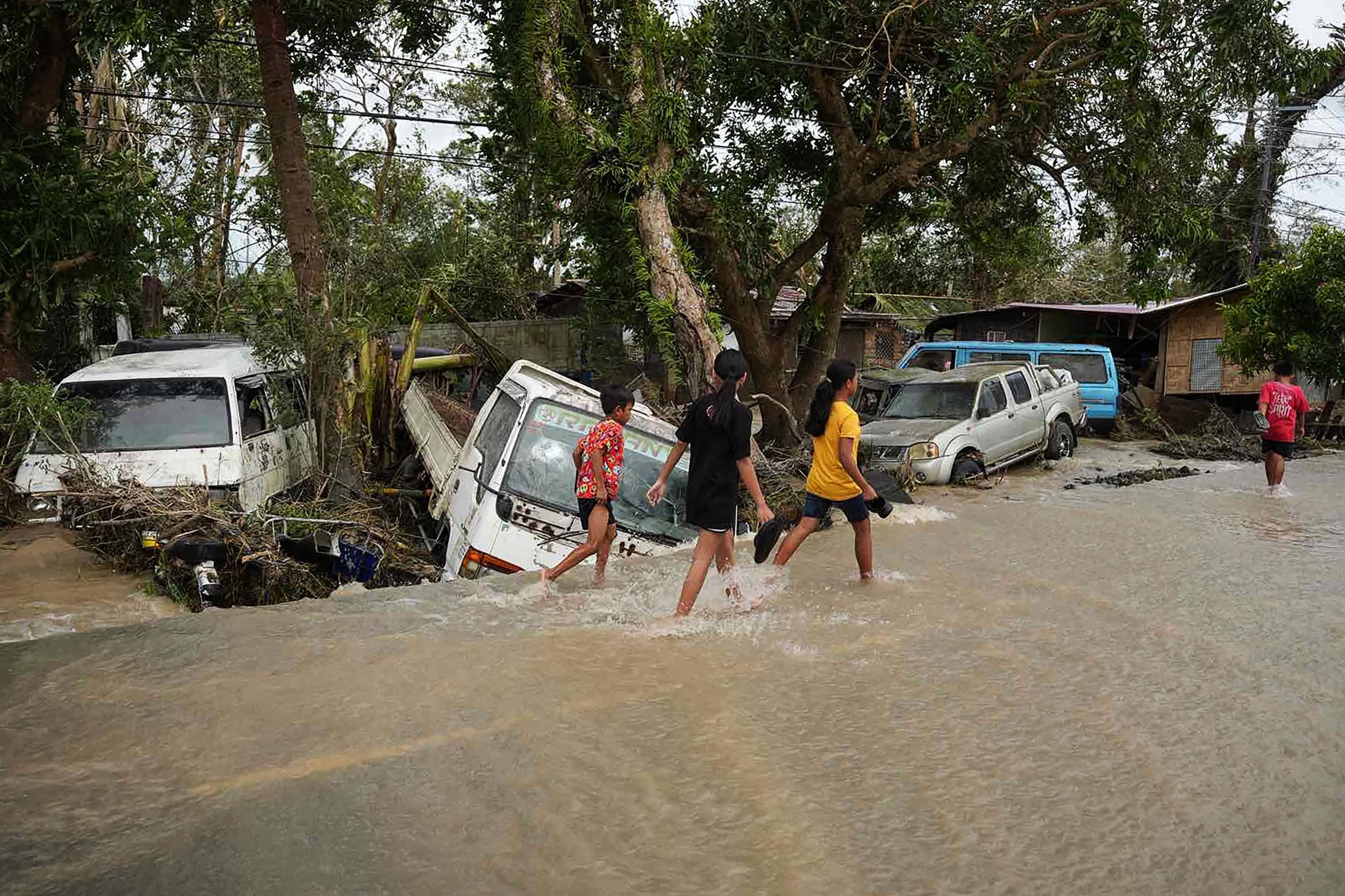 Philippines digs out from Typhoon Fung-wong as death toll climbs to 18