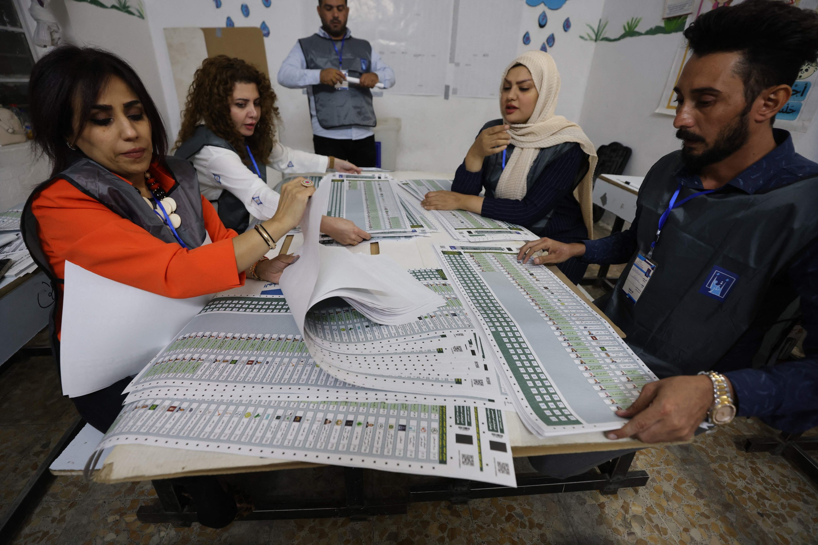 Iraqis vote for new parliament at a crucial regional moment