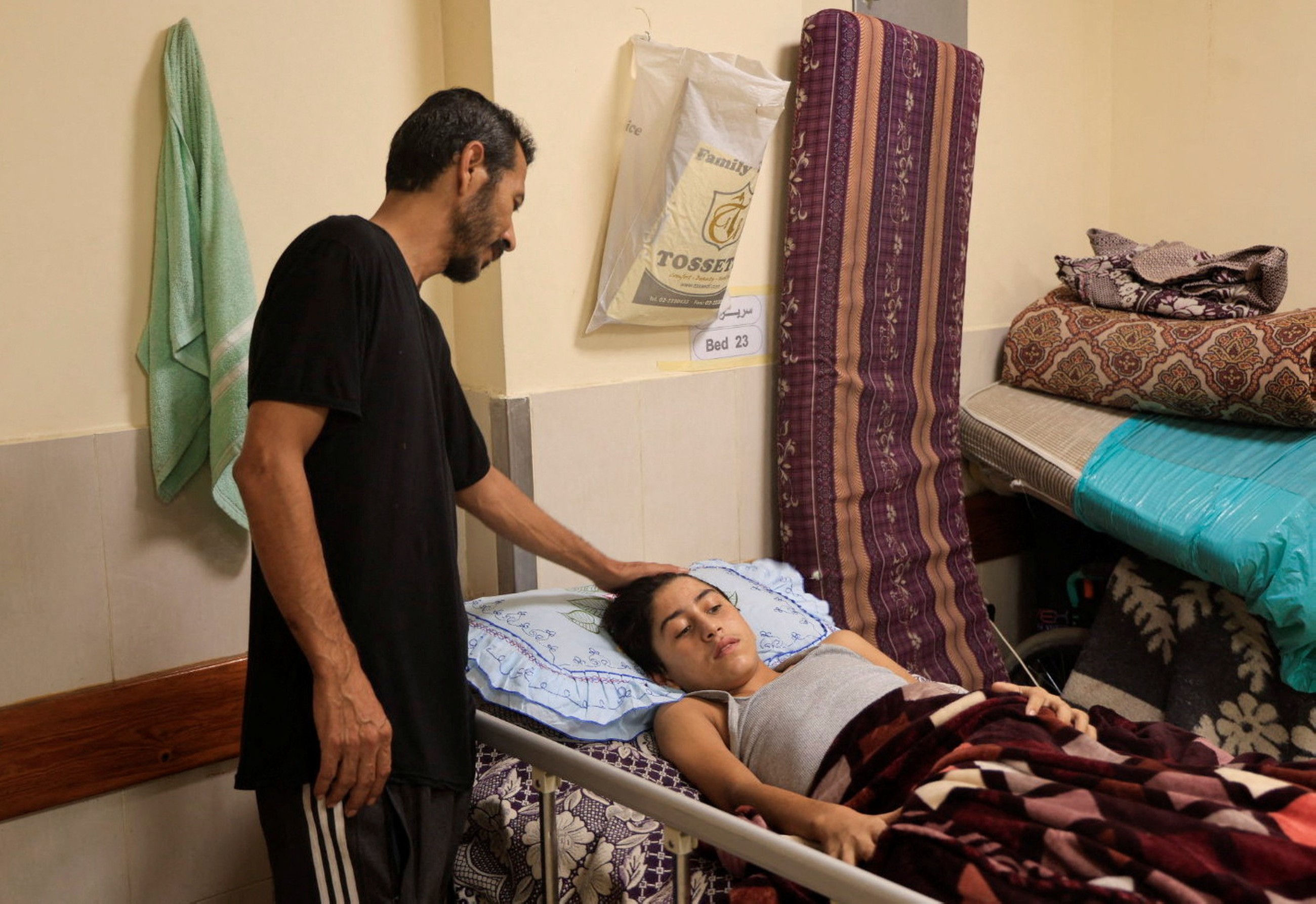 Gaza patients face a painful wait as hospitals sag under burden of cases