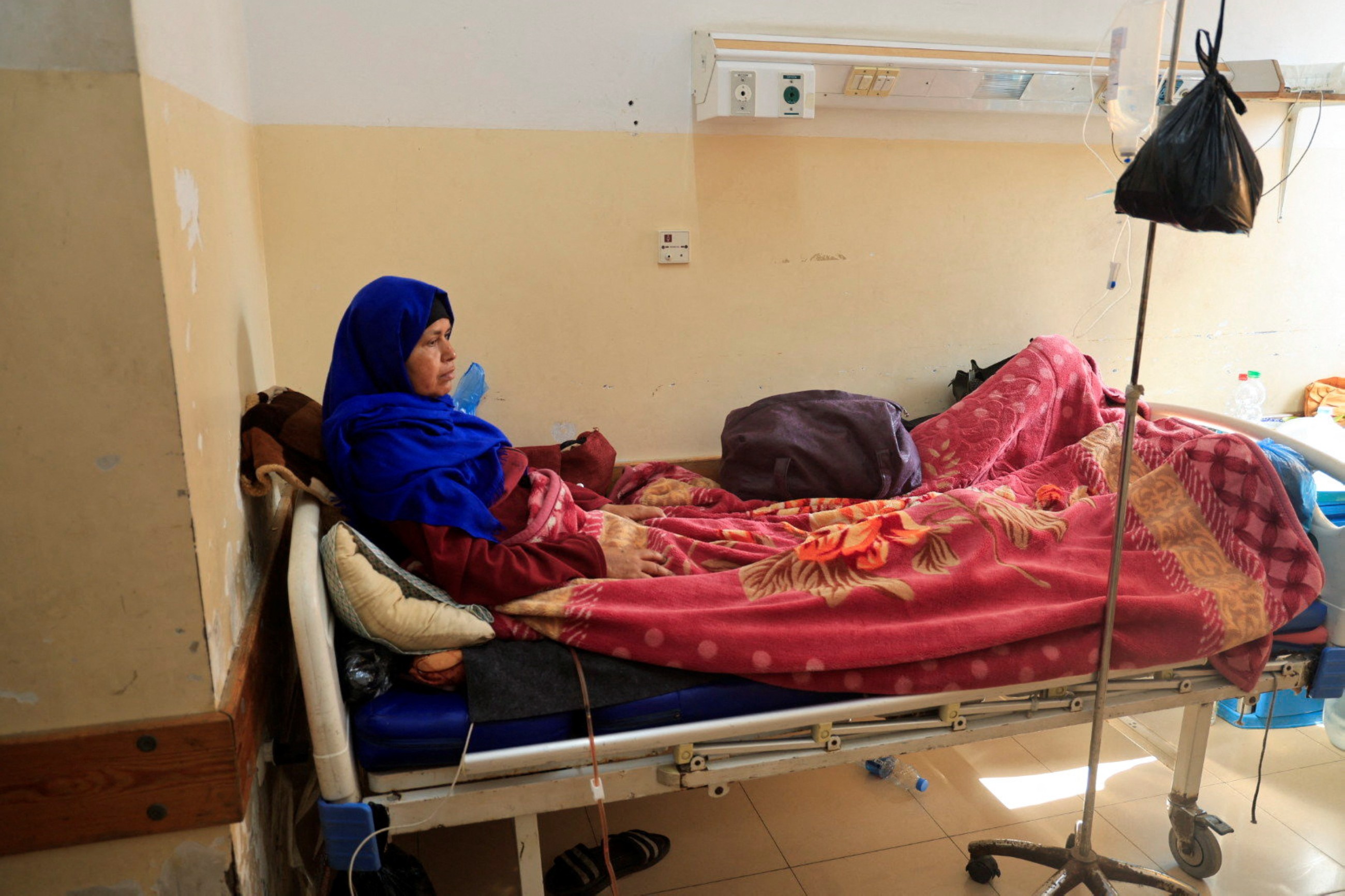 Gaza patients face a painful wait as hospitals sag under burden of cases
