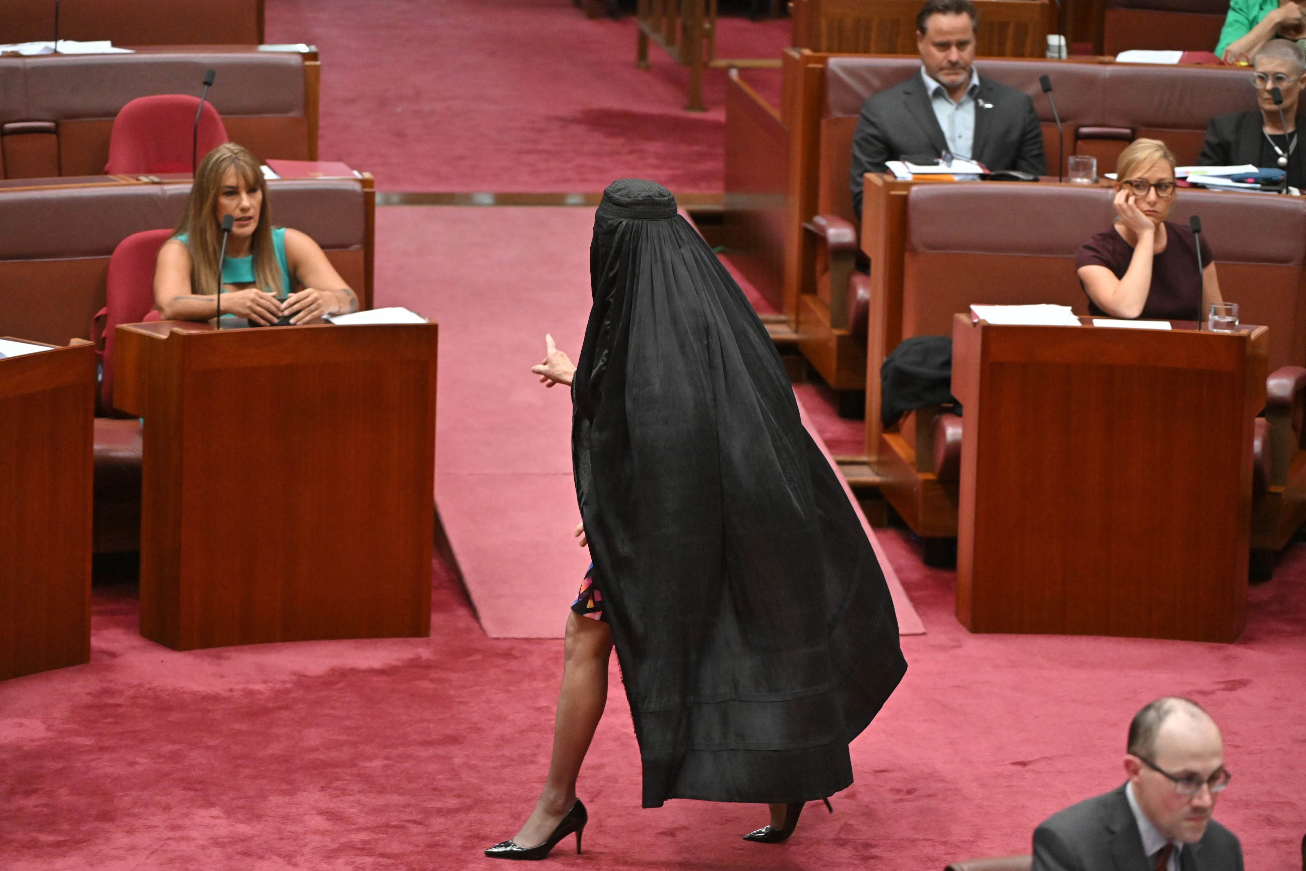 Australian far-right senator's move to wear burqa in parliament sparks outrage